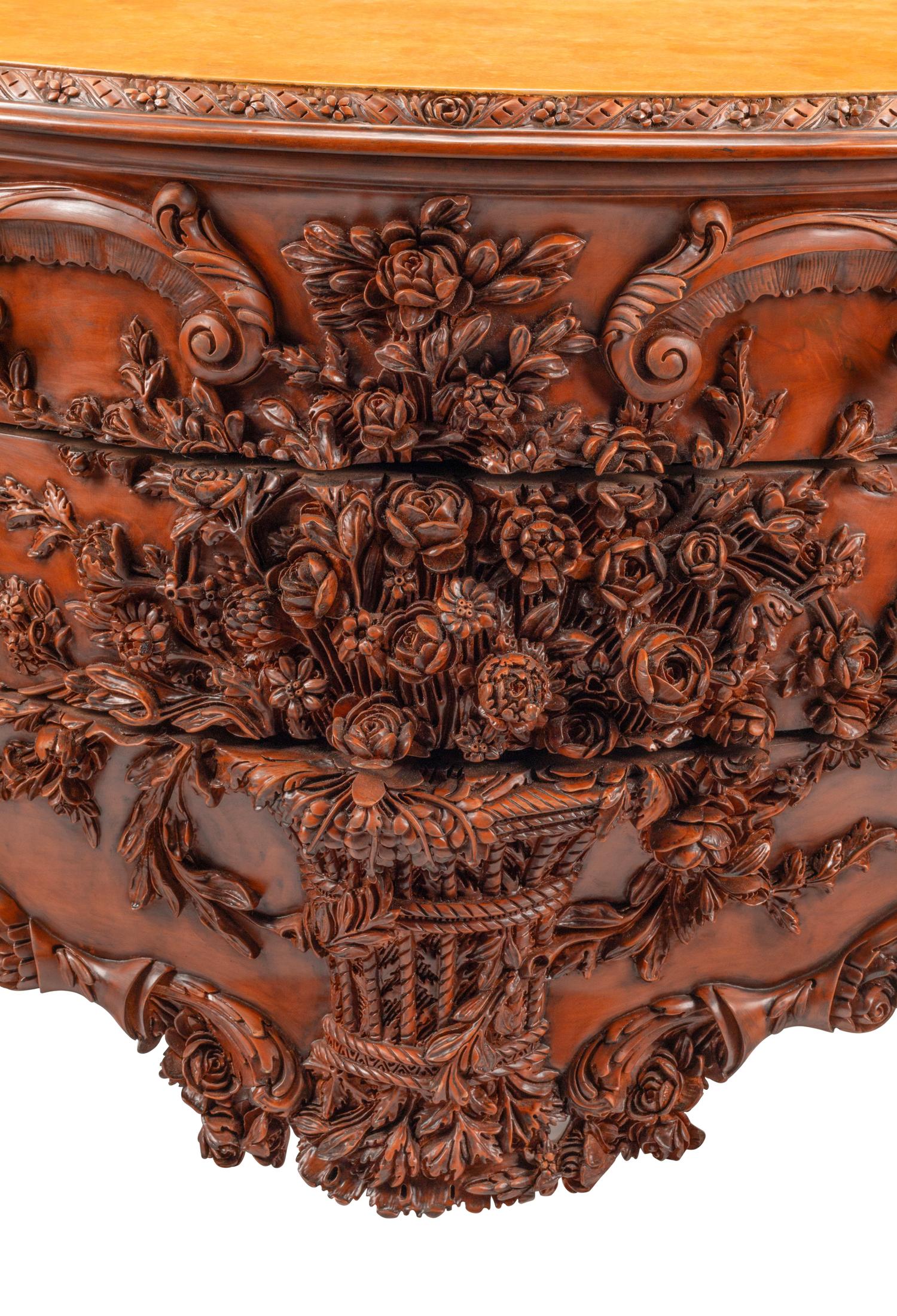 A Continental Floral-Carved and Painted Wood Commode