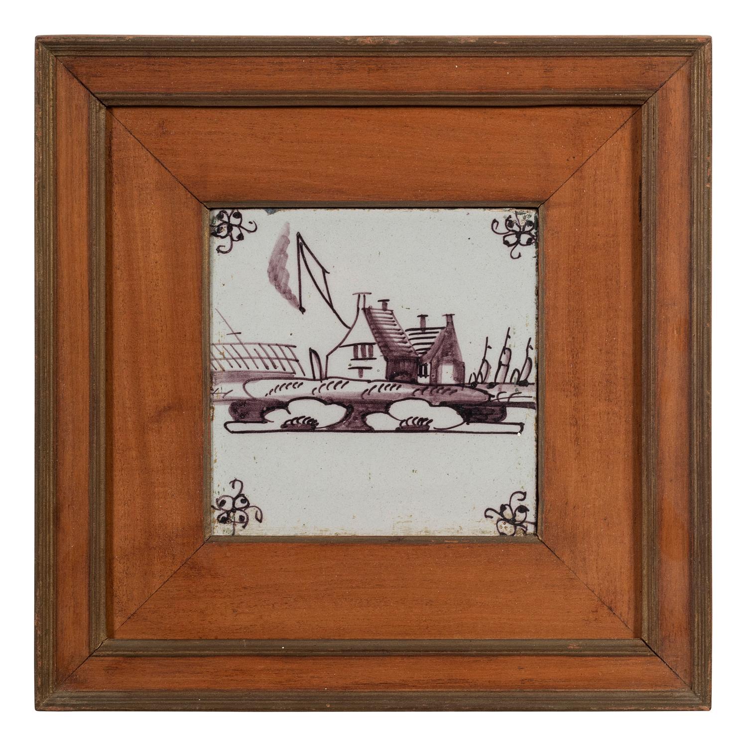 A Set of Five Framed Puce Delft Tiles