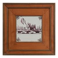 A Set of Five Framed Puce Delft Tiles