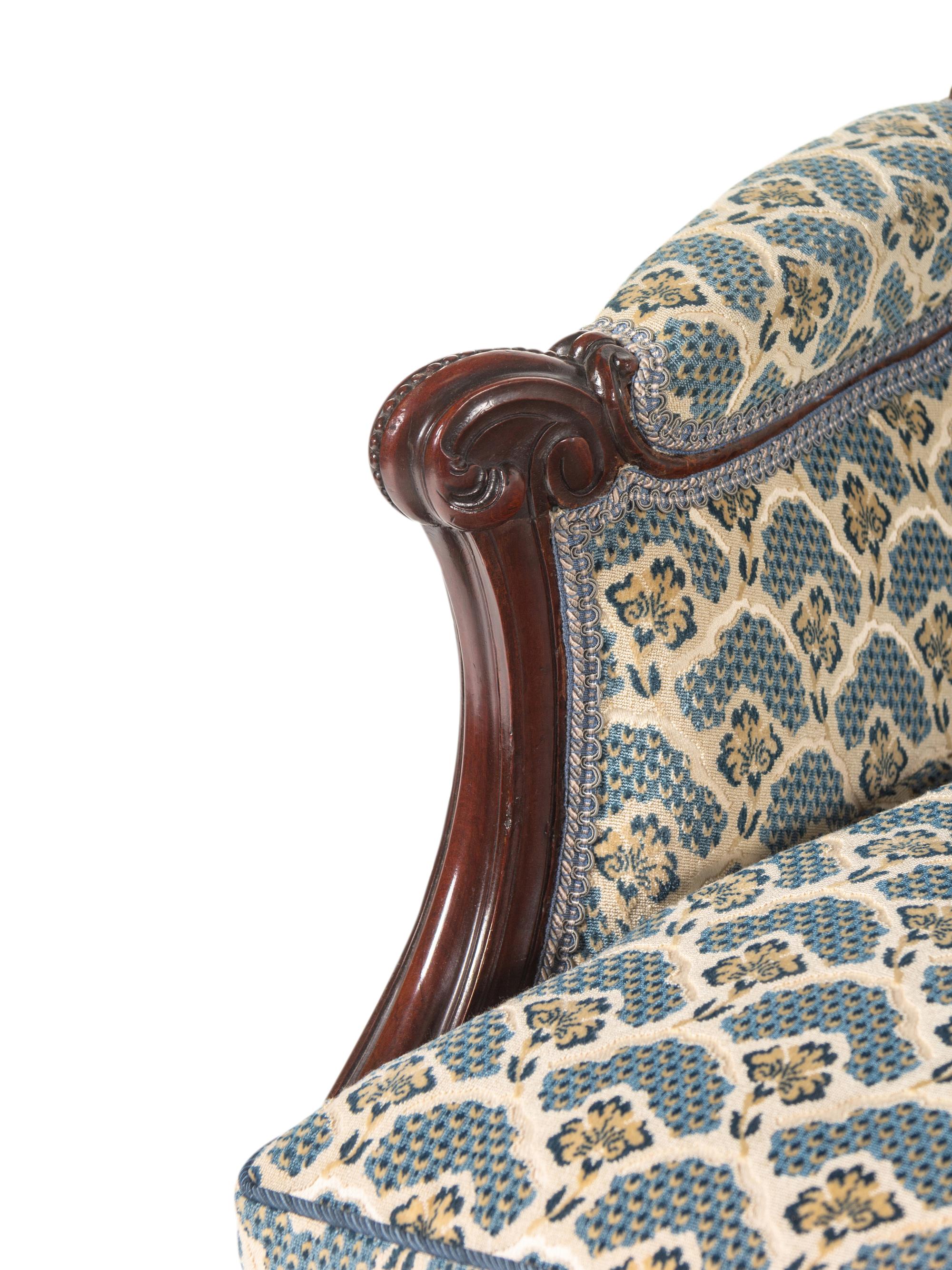 A George III Carved Mahogany Settee