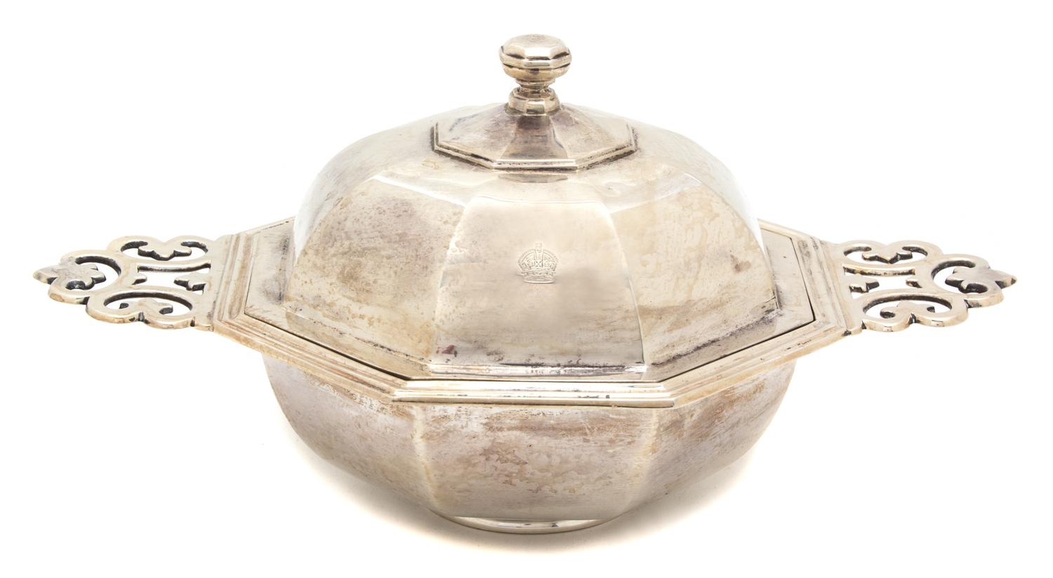 An English Silver Octagonal Serving Bowl, Charles Stuart Harris, London, 1911, having pierced porringer style handles, insert