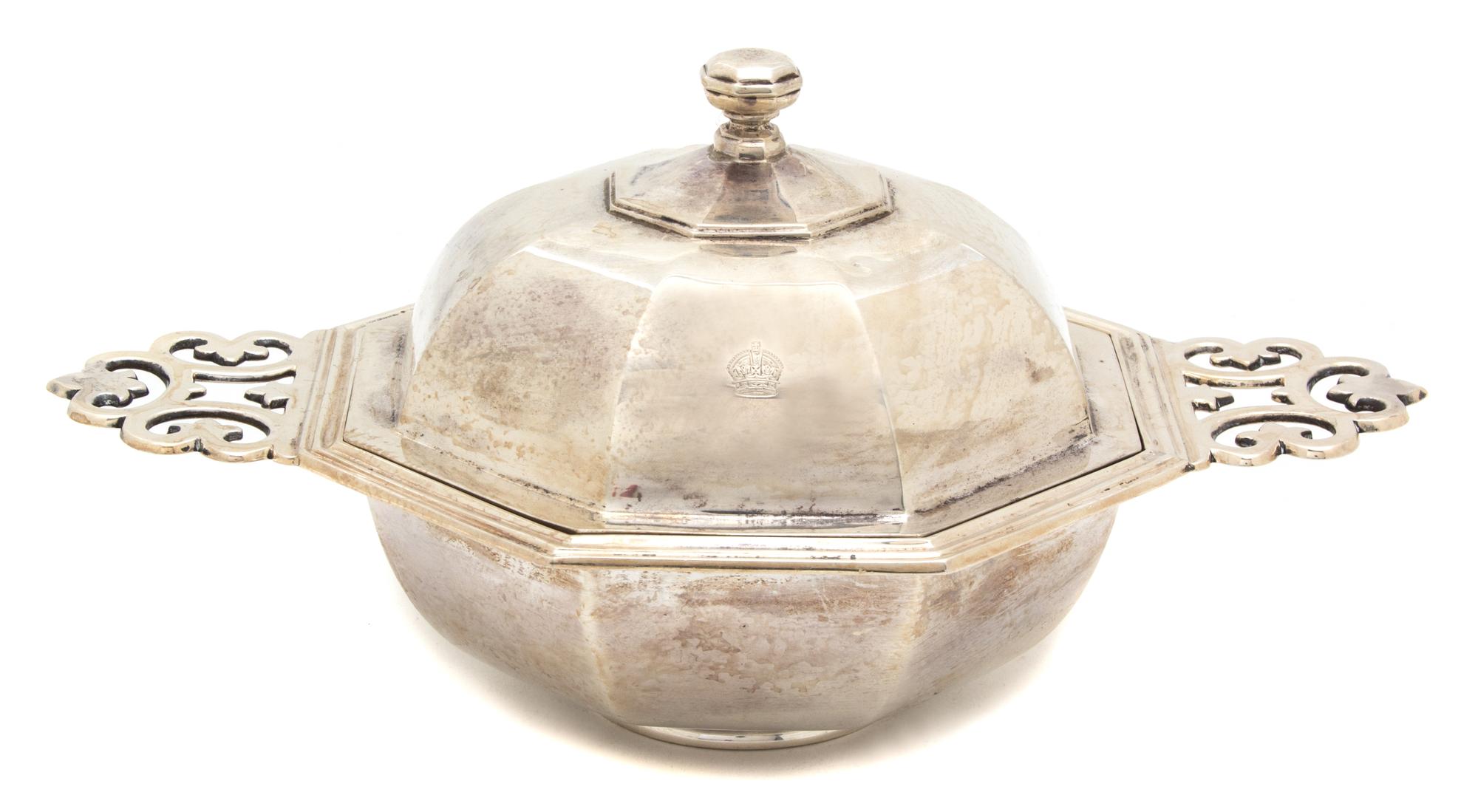 An English Silver Octagonal Serving Bowl, Charles Stuart Harris, London, 1911, having pierced porringer style handles, insert