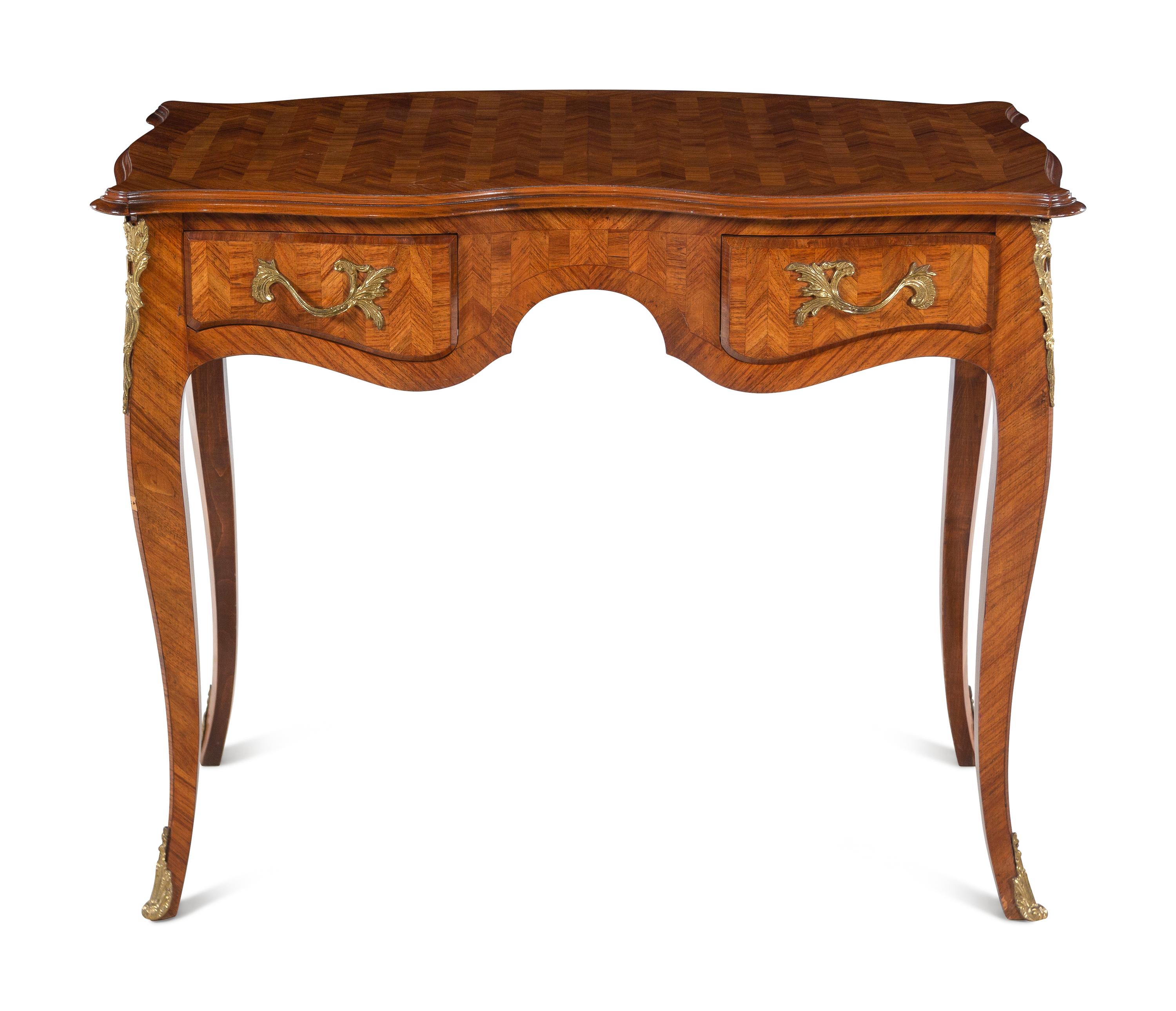 A Louis XV Style Gilt Metal Mounted Parquetry Desk