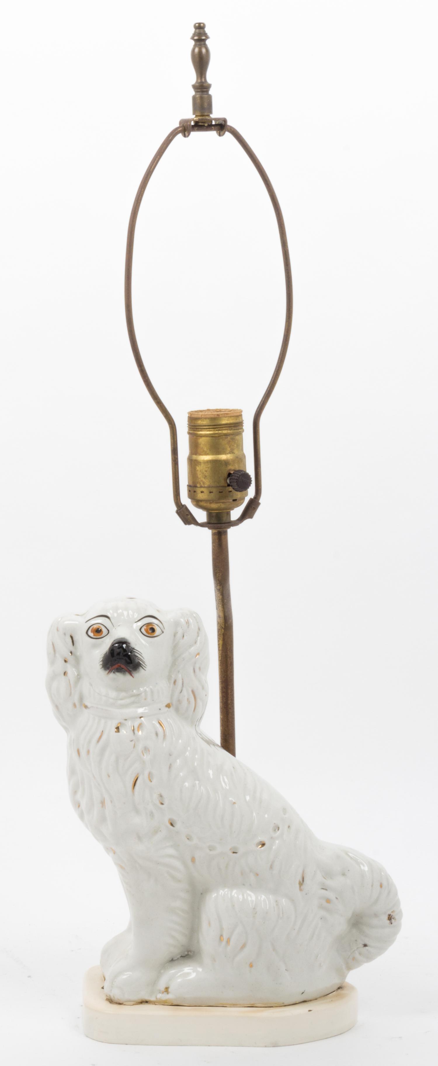 A Staffordshire Spaniel Height 14 1/2 inches. — 19TH CENTURY