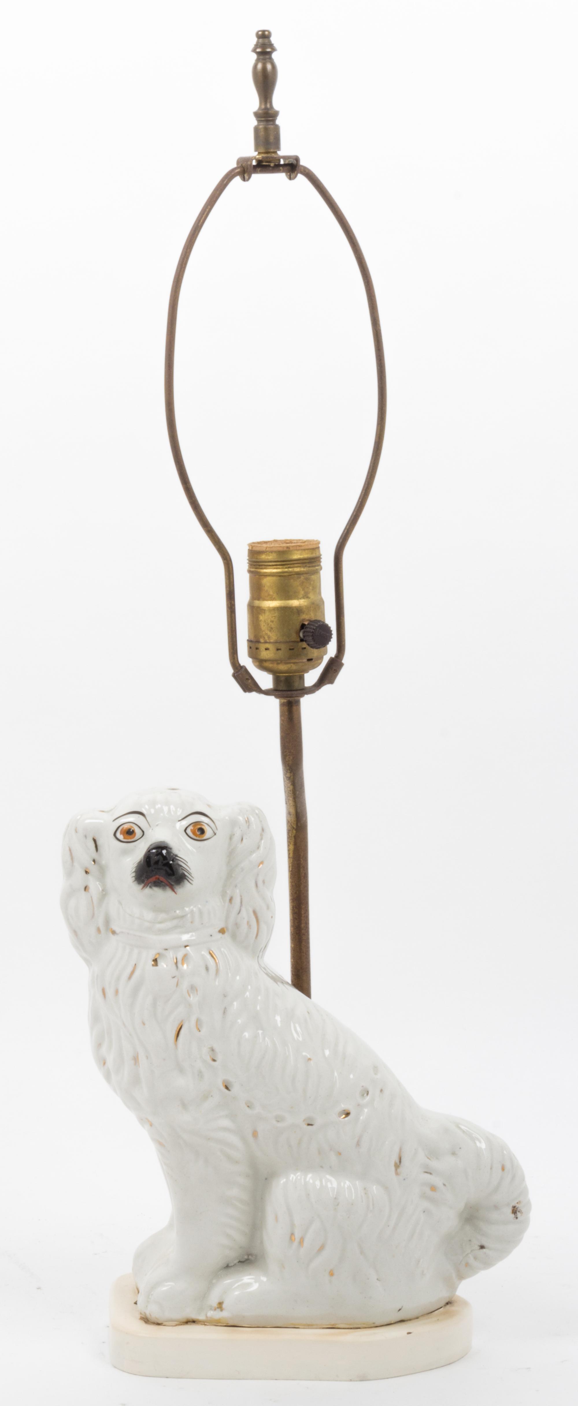 A Staffordshire Spaniel Height 14 1/2 inches. — 19TH CENTURY
