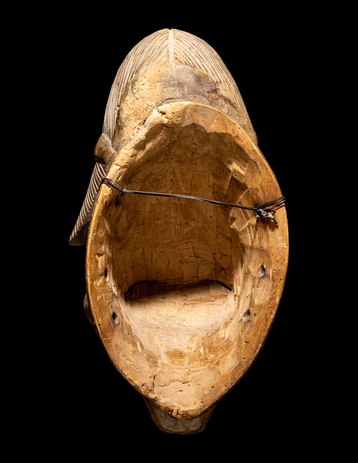 Four Punu Wood Masks