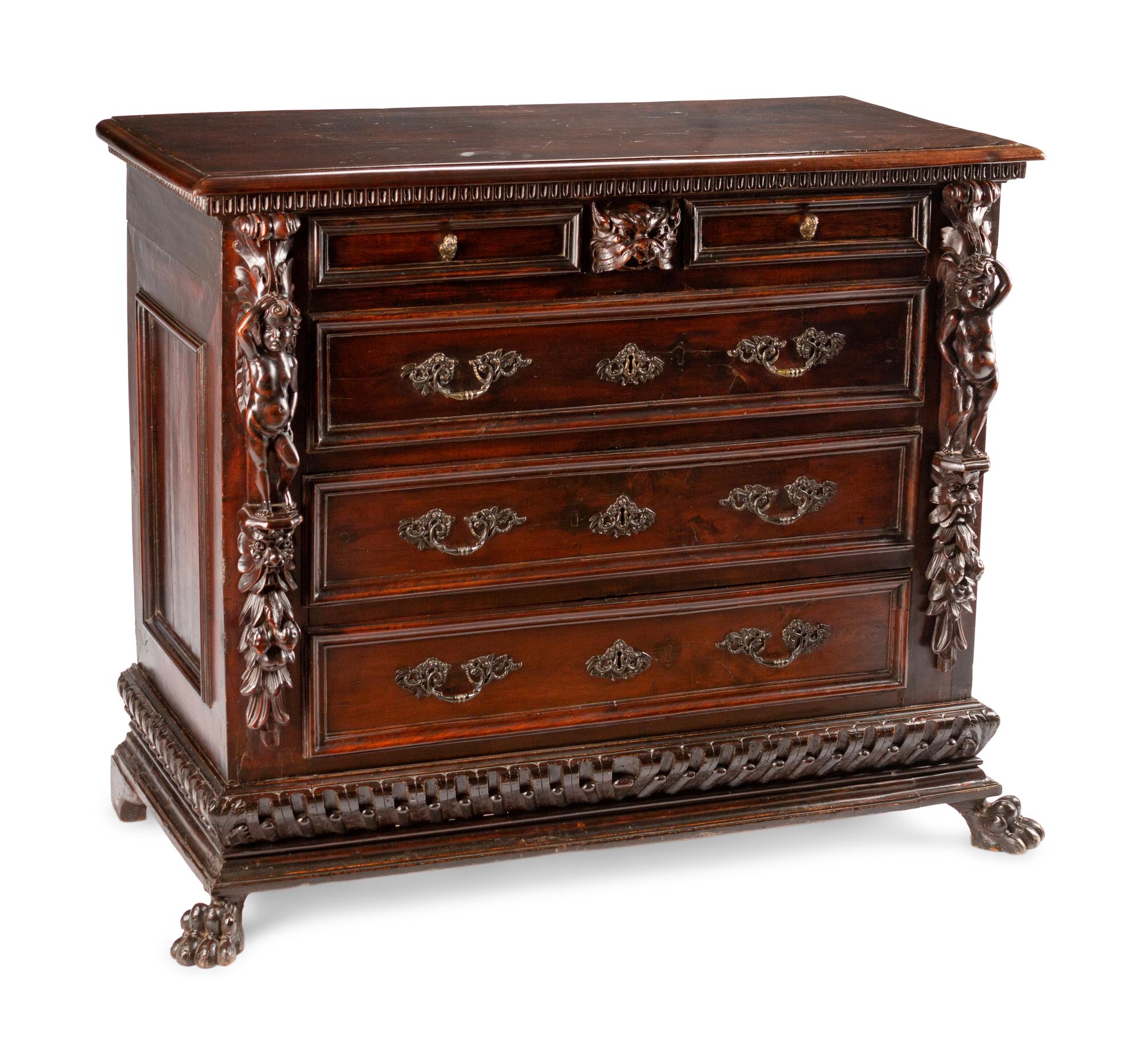 An Italian Baroque Walnut Chest of Drawers