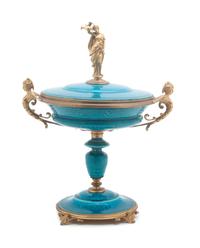 A Continental Gilt Bronze Mounted Ceramic Tazza Height 14 3/4 inches. — 19TH/20TH CENTURY