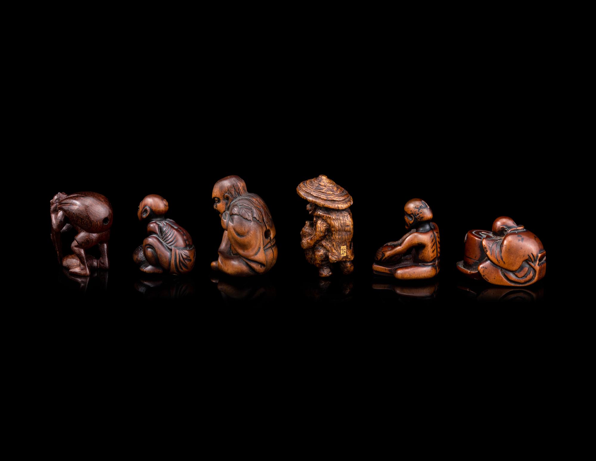 Six Japanese Carved Wood and Bamboo Figural-Form Netsuke