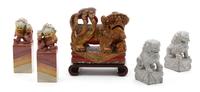 Two Pairs of Chinese Fu Dog Seals and a Red and Gilt Lacquer Stone Fu Dog Ornment