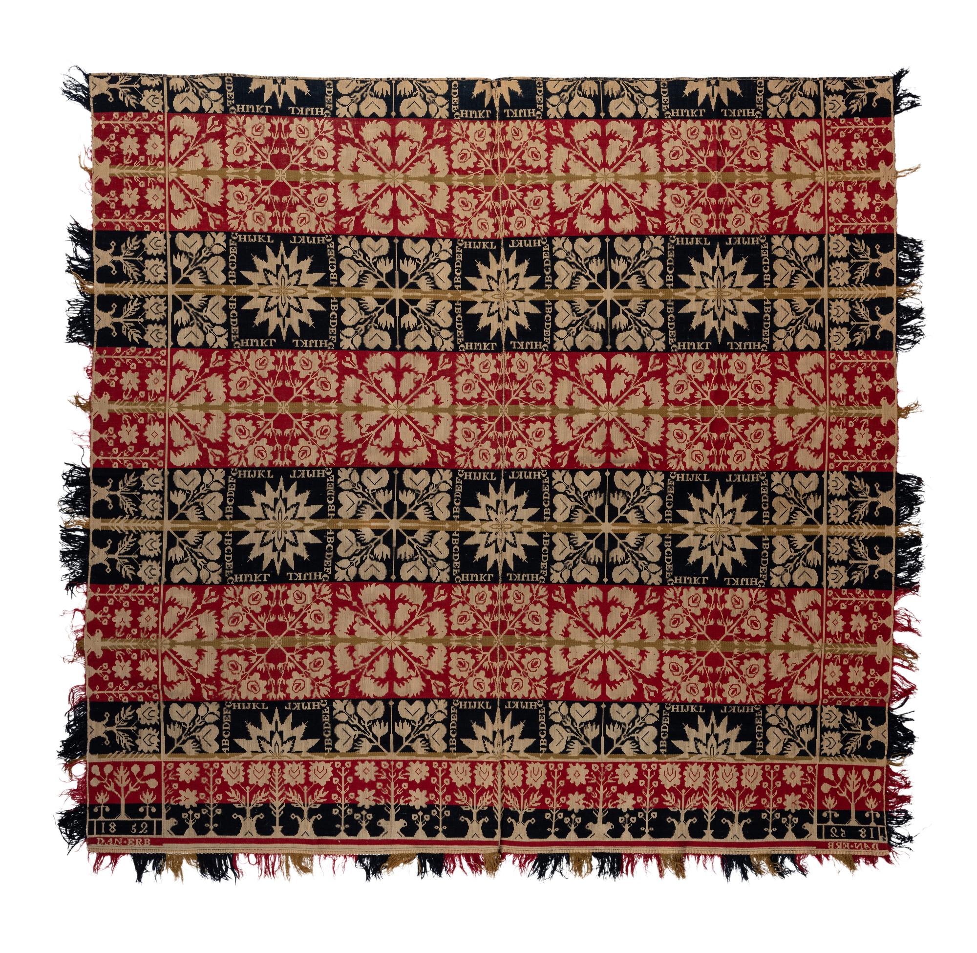 An Alphabet and Foliate Medallion Jacquard Coverlet