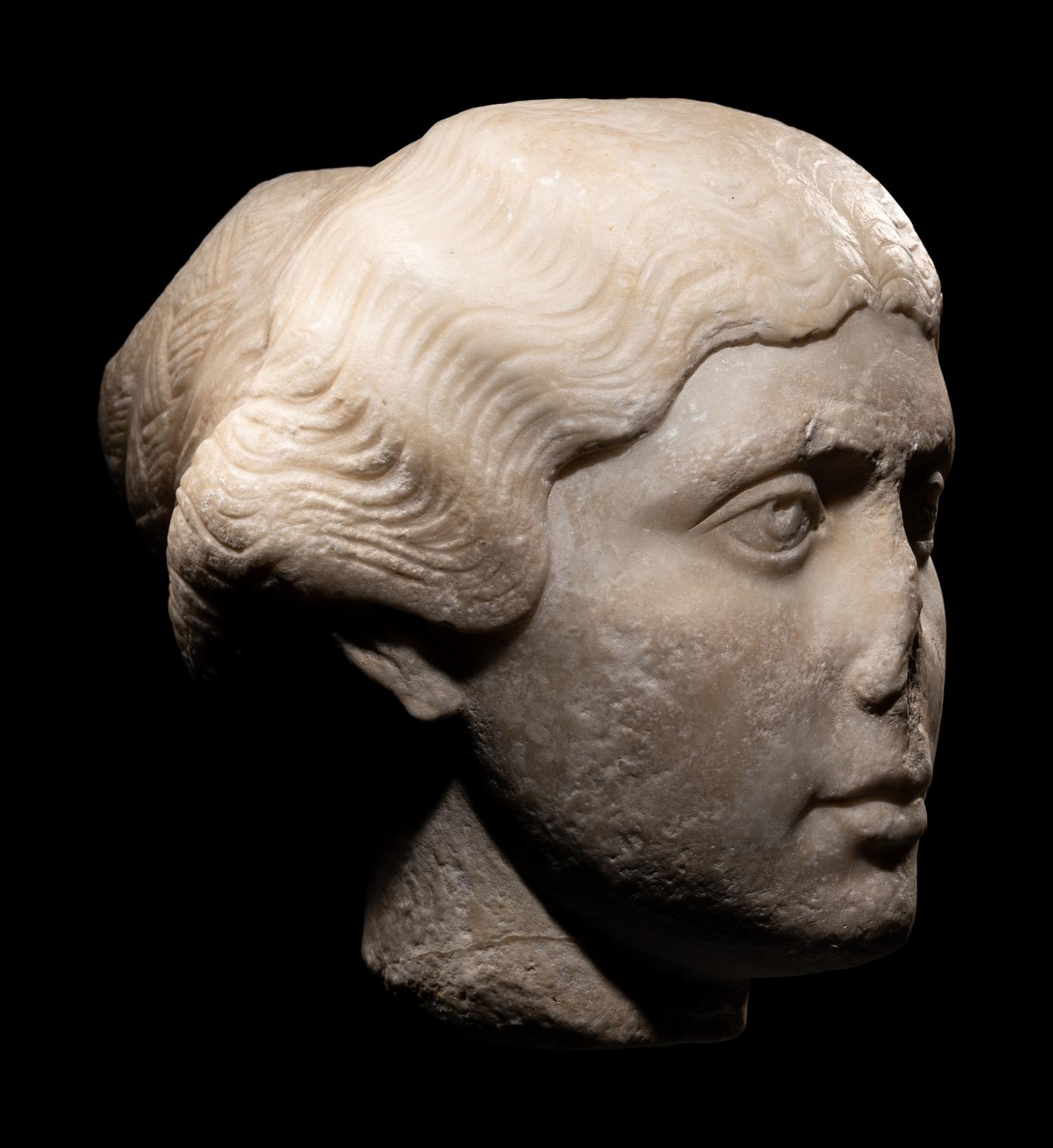 A Roman Marble Portrait Head of a Young Lady