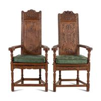 Two French Renaissance Revival Oak Caquetoires