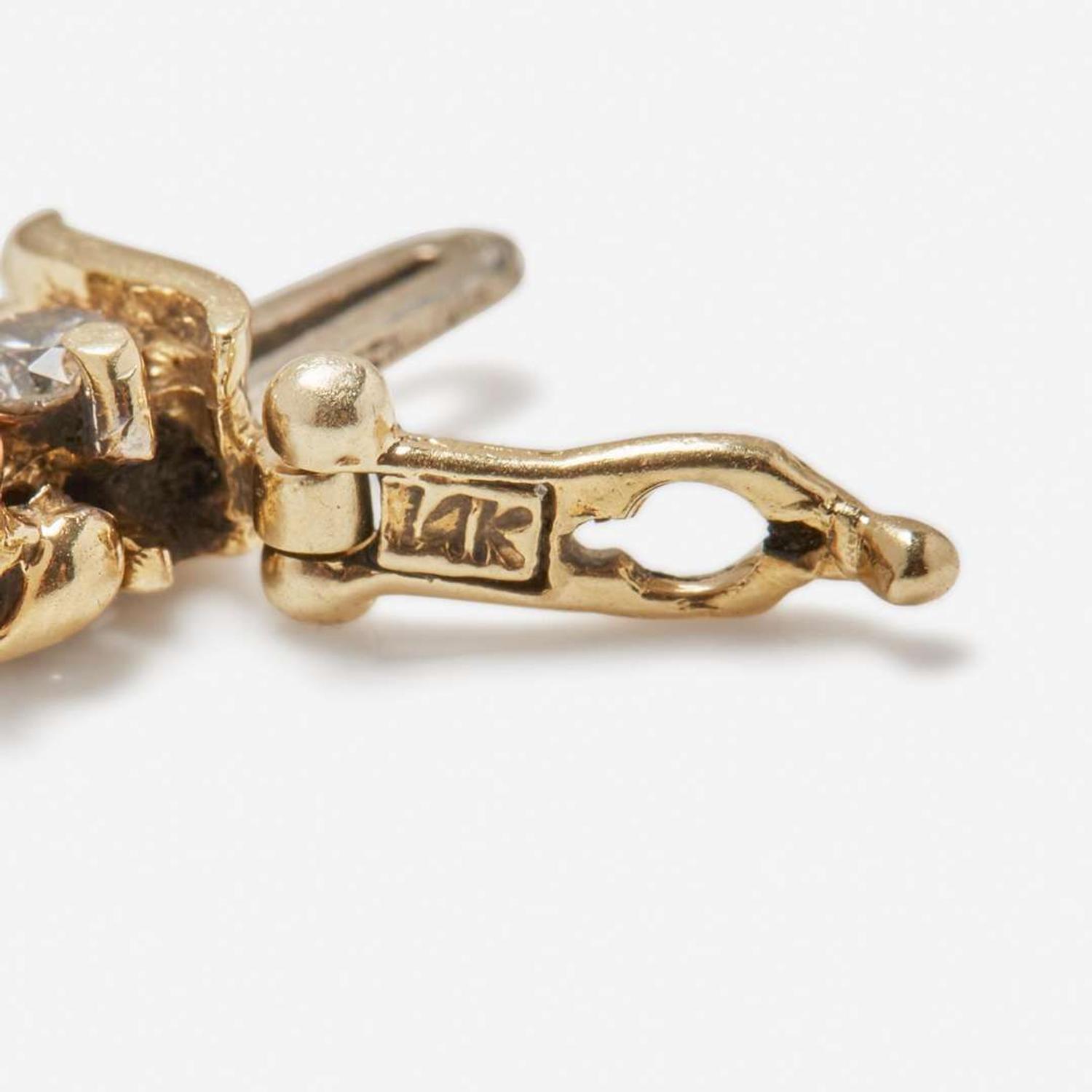A 14K Yellow Gold and Diamond Bracelet