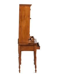 A Late Federal Cherrywood Step-Back Secretary Bookcase
