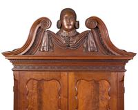A Chippendale Carved Walnut Desk And Bookcase