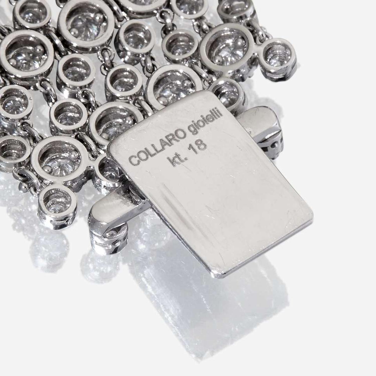 An eighteen karat white gold and diamond bracelet