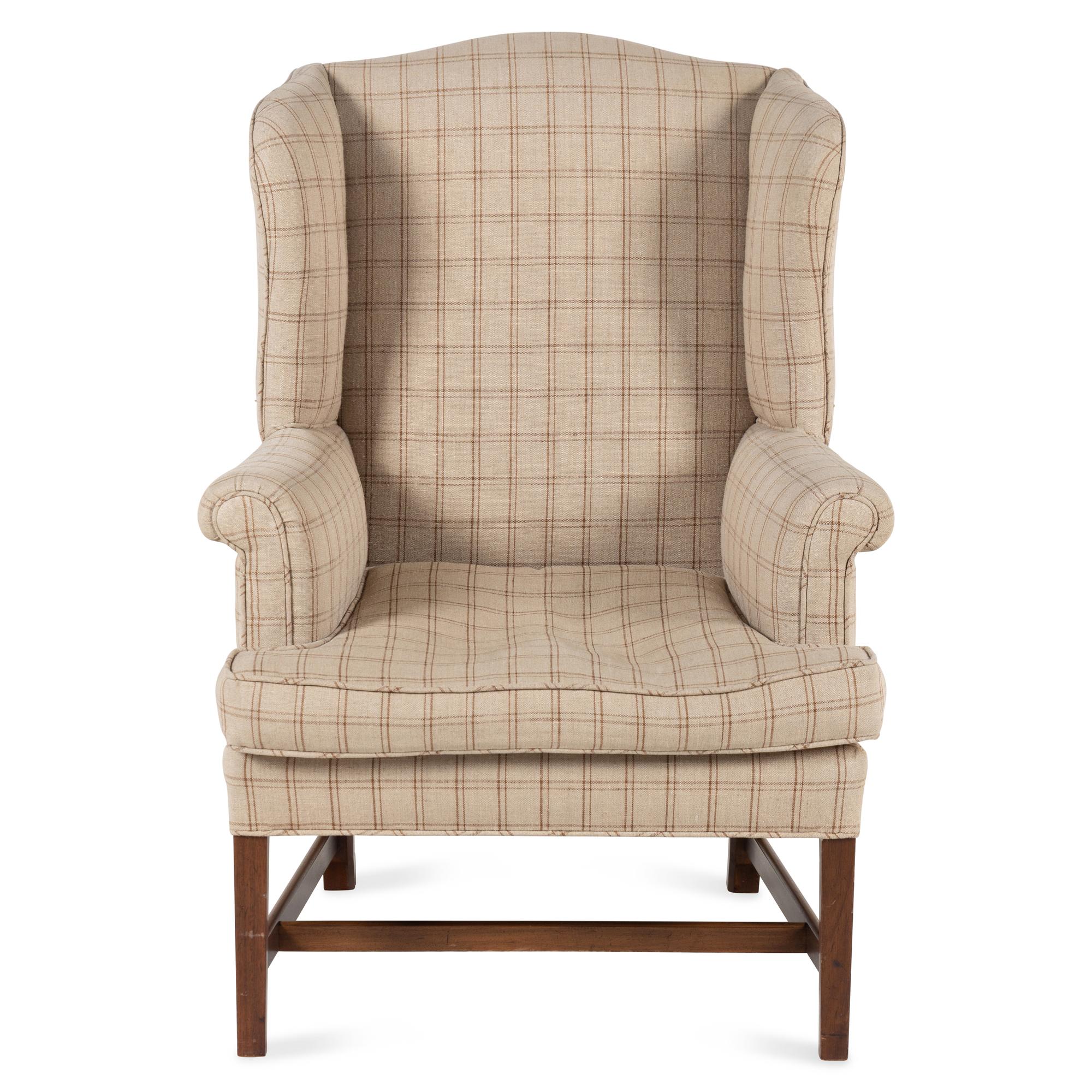An English Mahogany Wingback Armchair
