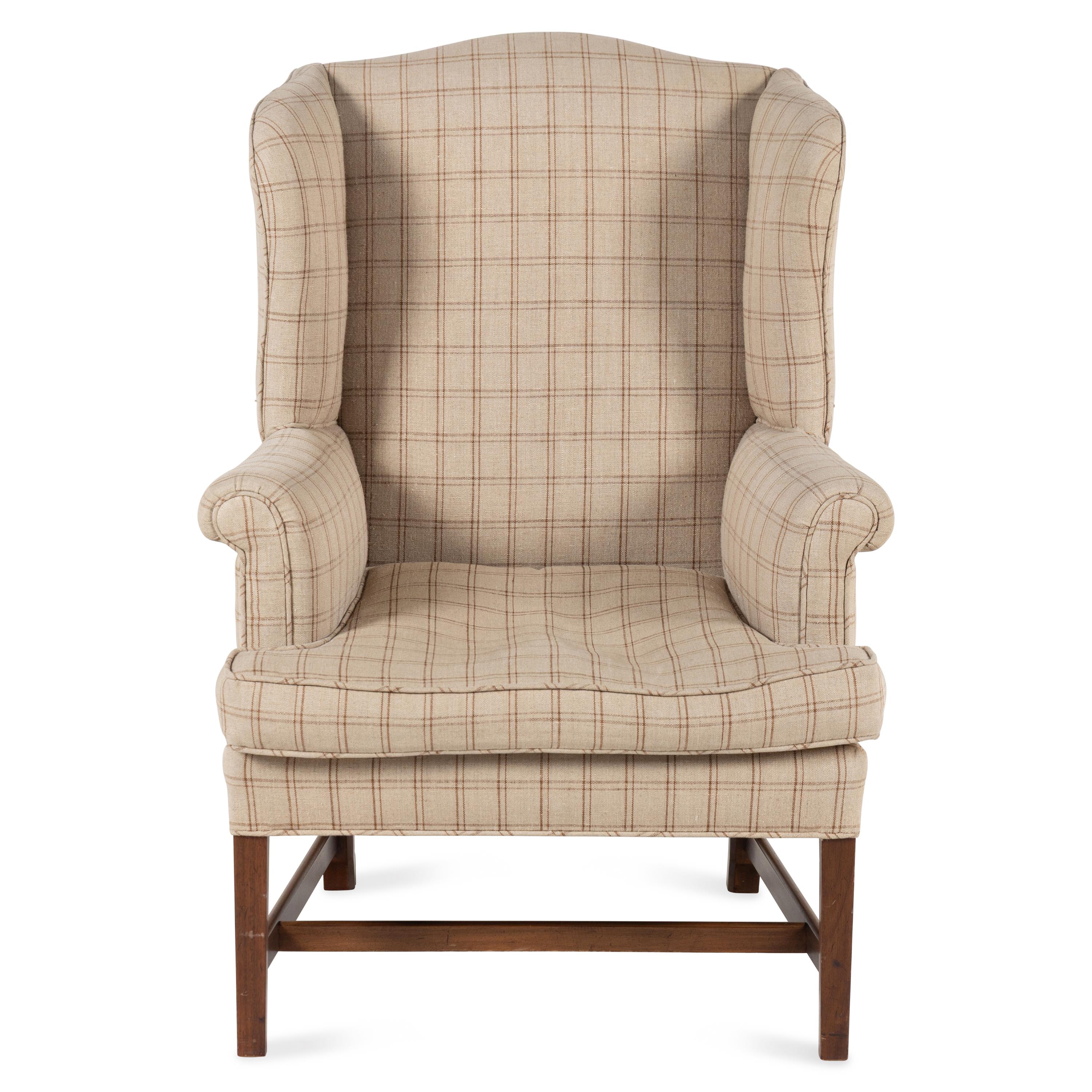 An English Mahogany Wingback Armchair