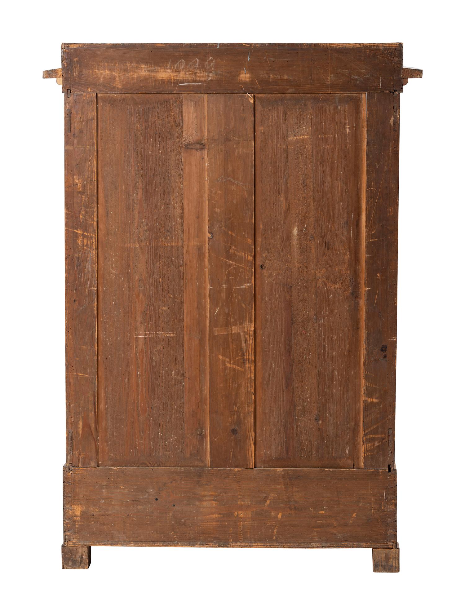 A Biedermeier Figured Birch Cabinet