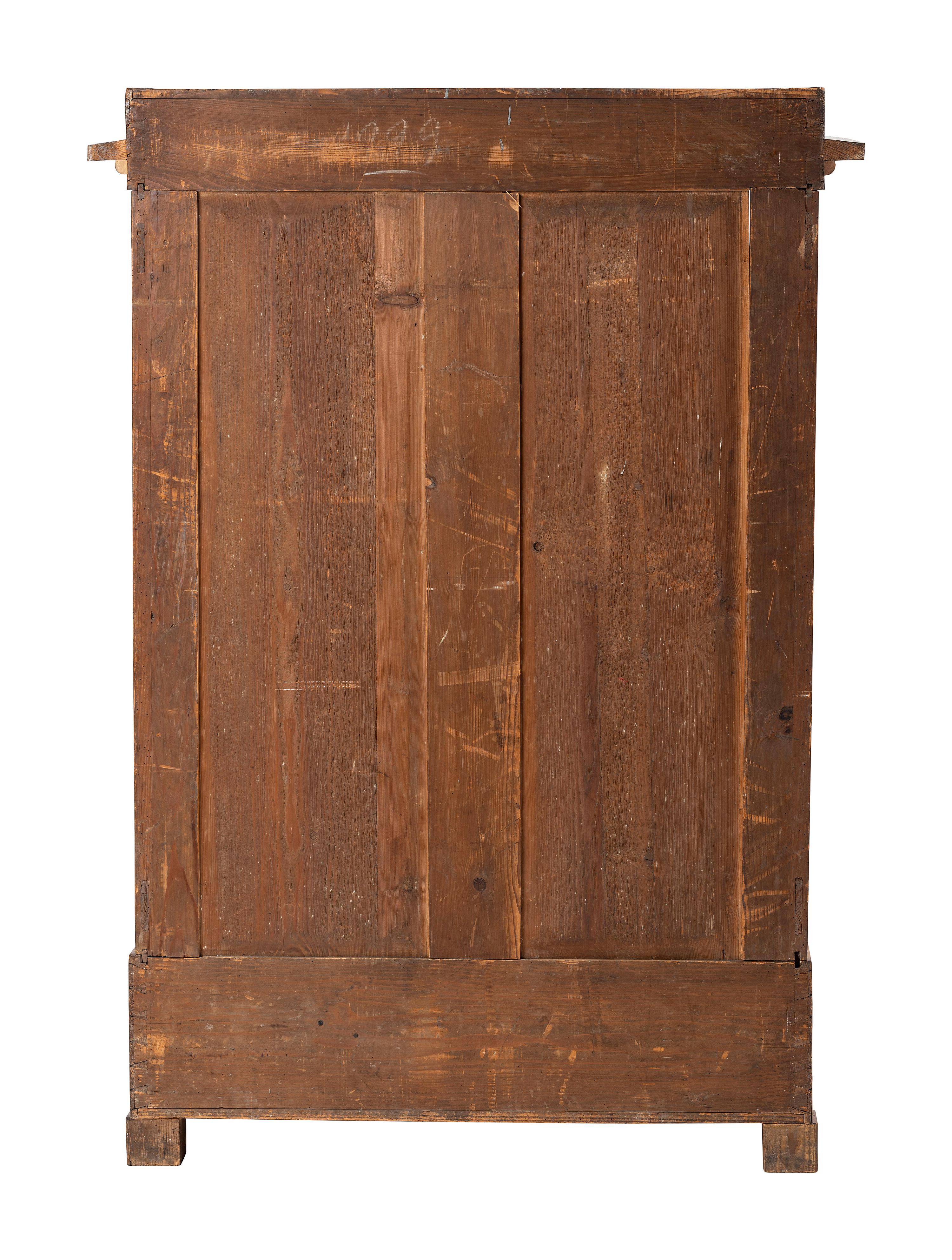 A Biedermeier Figured Birch Cabinet