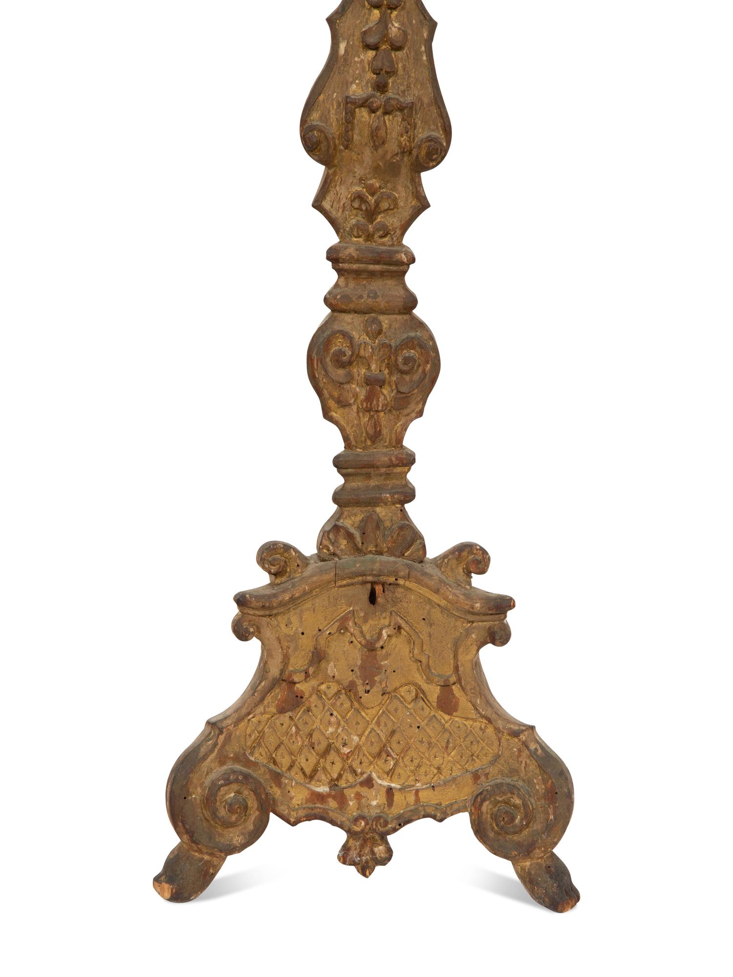 A Pair of Italian Baroque Style Carved Giltwood Pricket Sticks