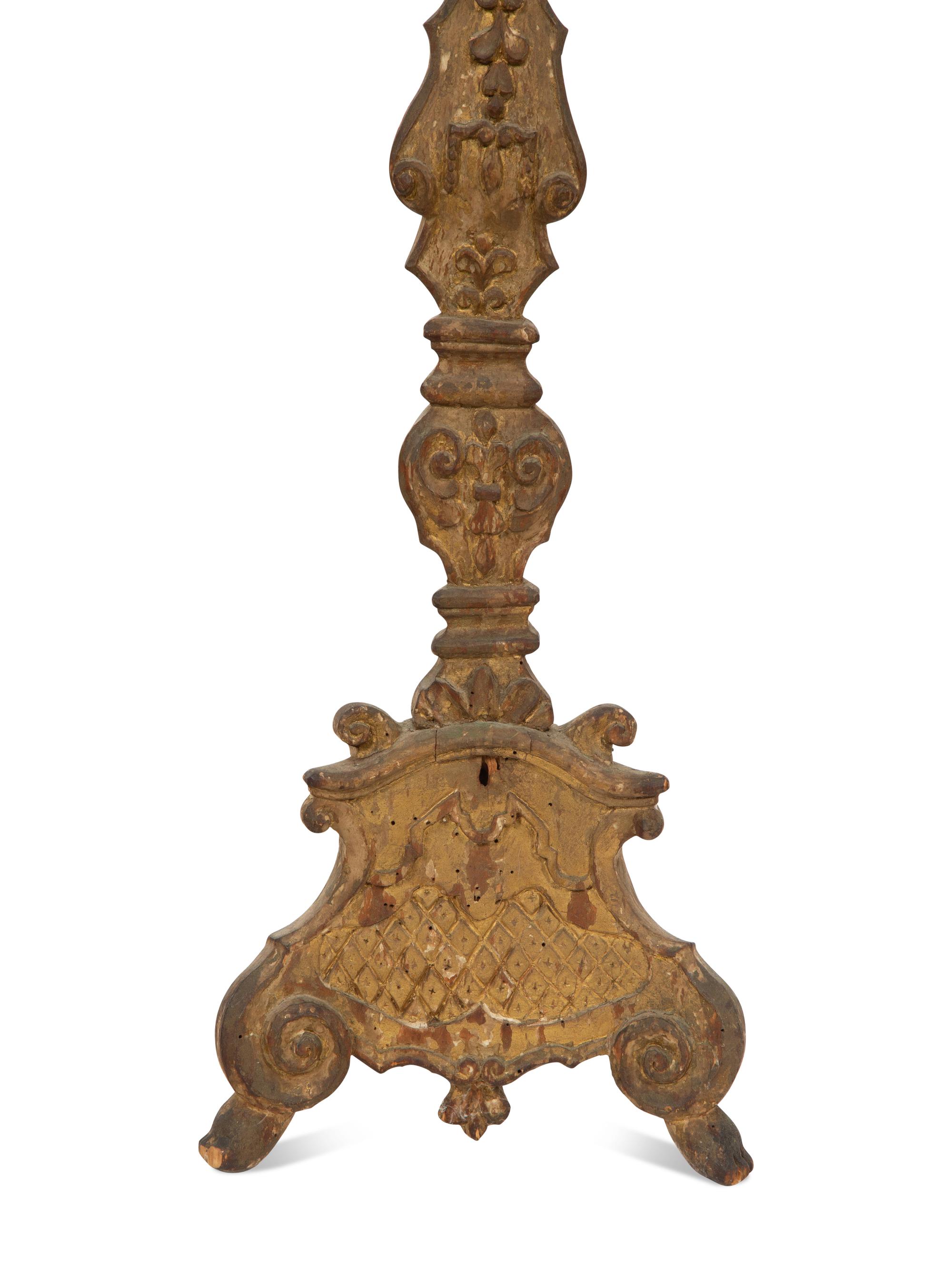 A Pair of Italian Baroque Style Carved Giltwood Pricket Sticks