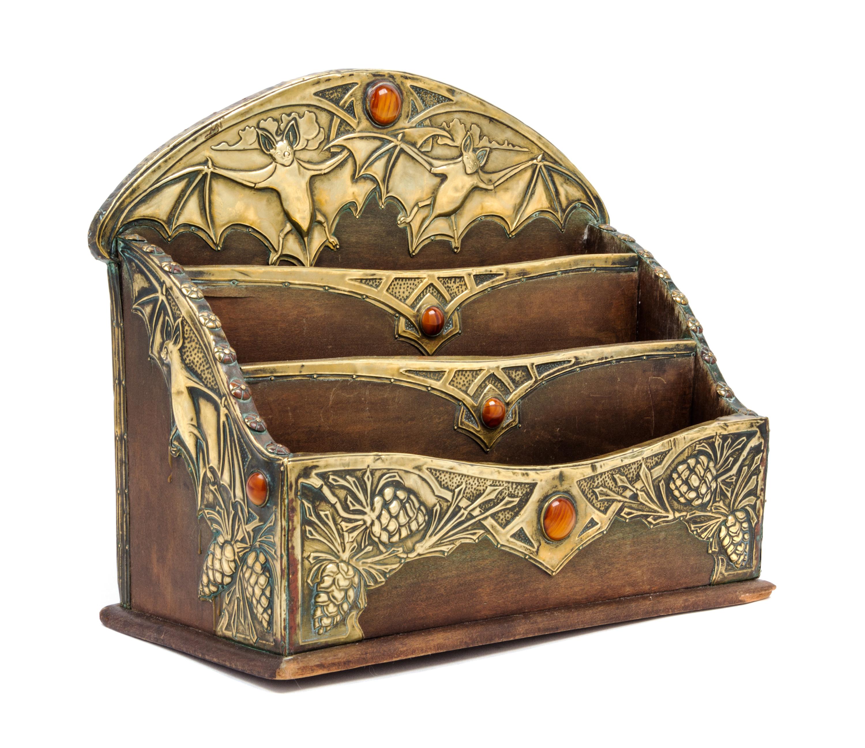 An Arts and Crafts Letter Rack Width 11 1/2 inches.