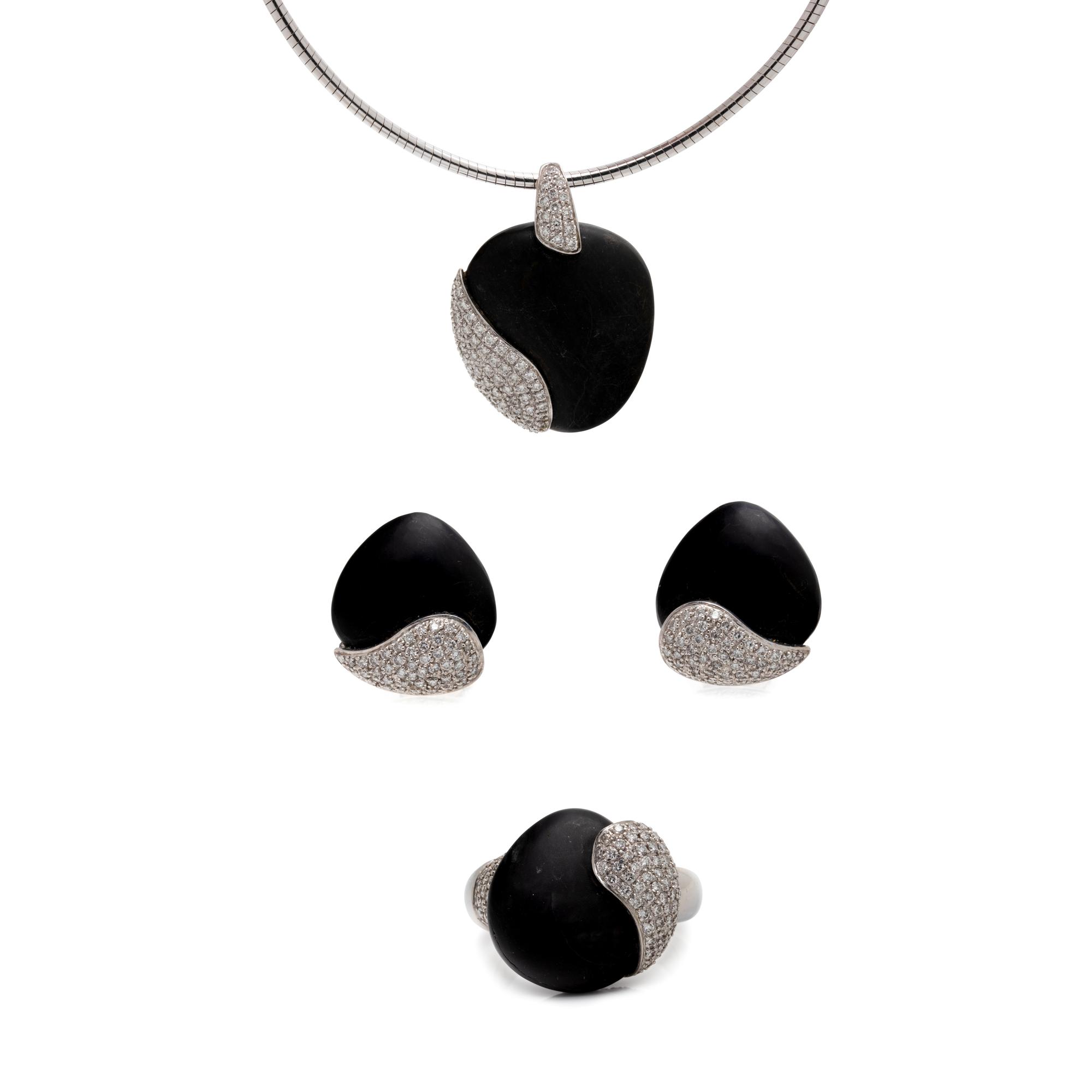 MOVADO, WHITE GOLD, PEBBLE AND DIAMOND SET
