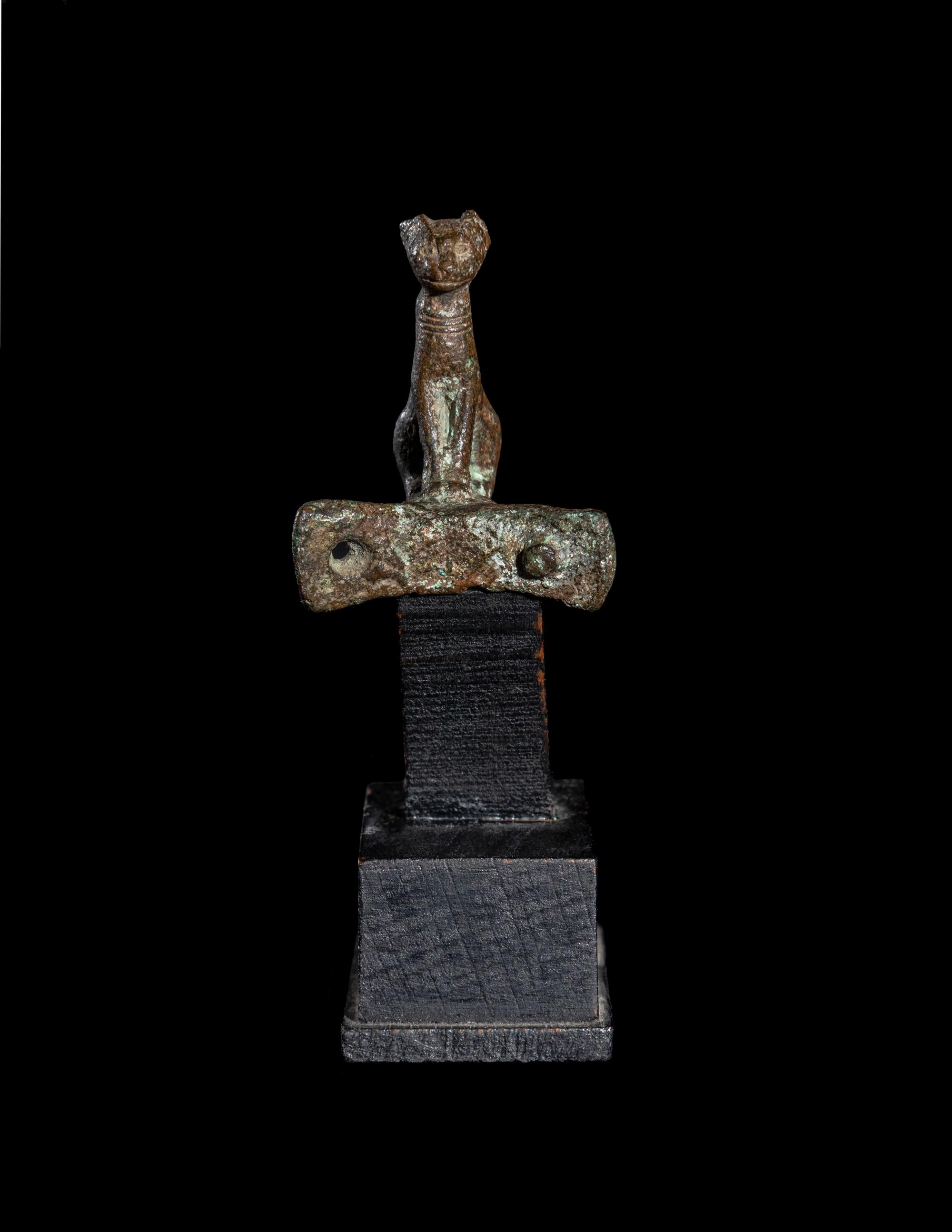 An Egyptian Bronze Handle with a Cat