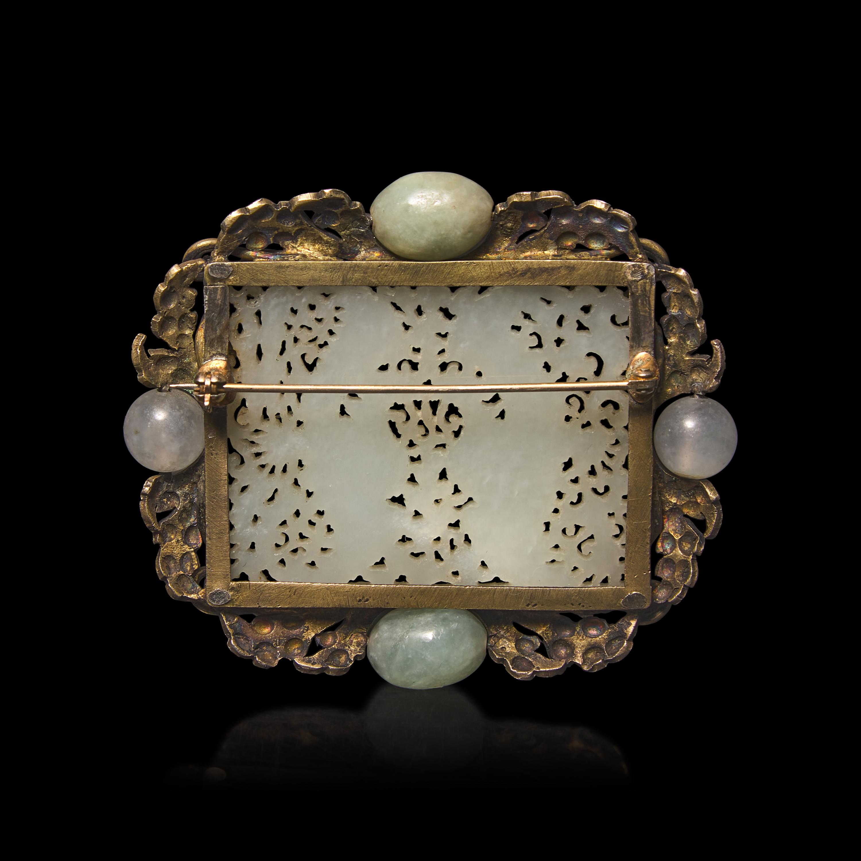 A Chinese White Jade 'Double Phoenix' Belt Plaque, Ming Dynasty 明 白玉鏤雕雙鳳紋帶板