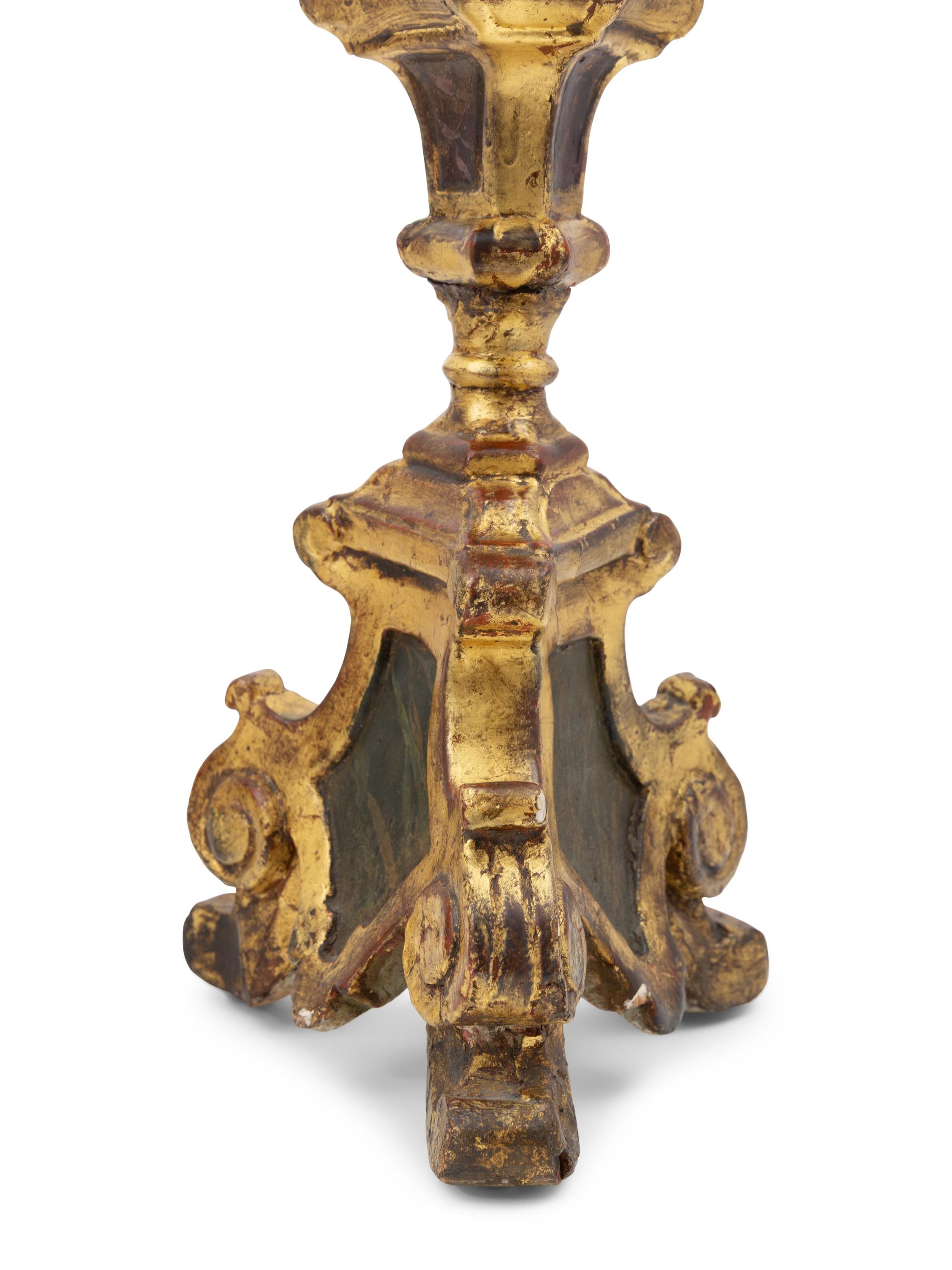 A Pair of Continental Baroque Style Painted and Giltwood Prickets