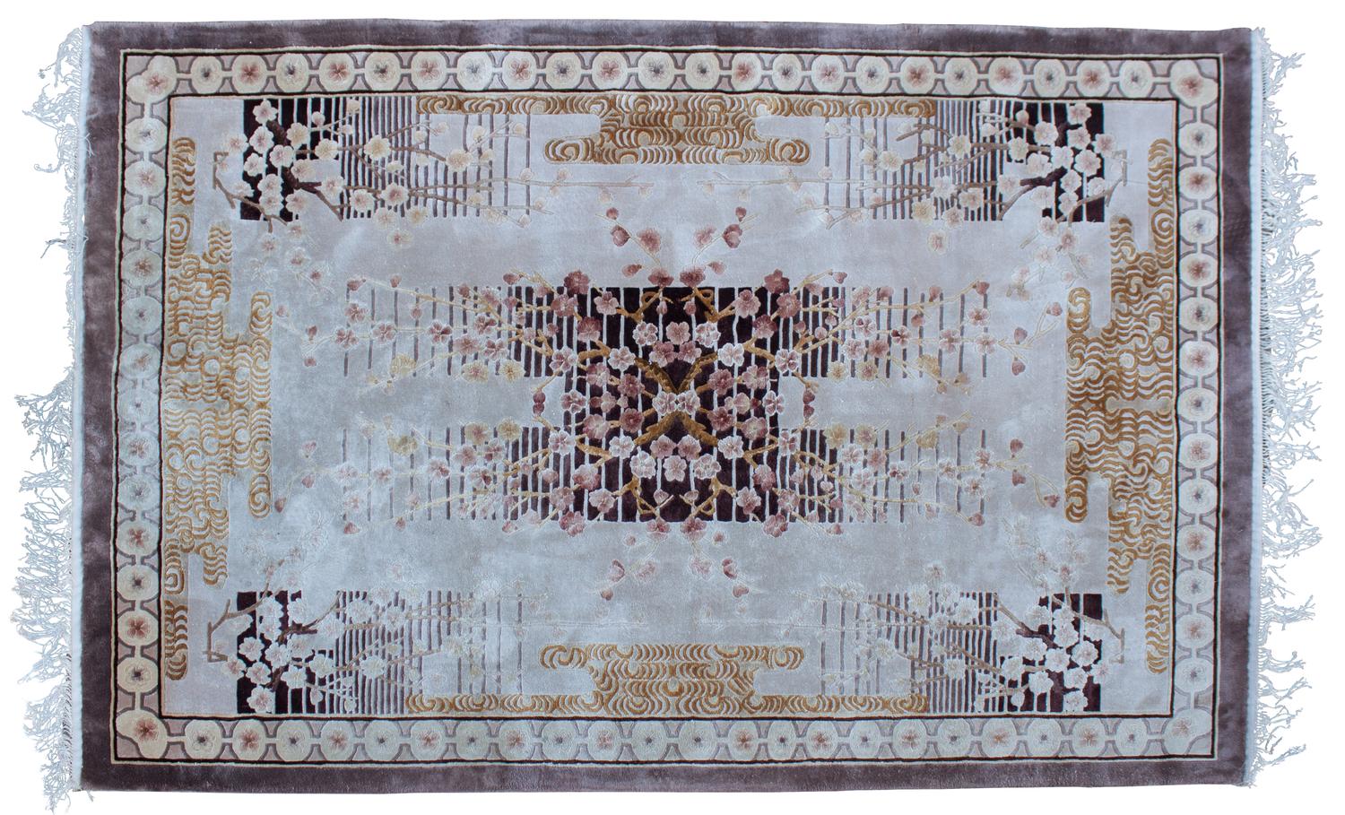 An Oriental Wool Rug 6 feet x 4 feet.