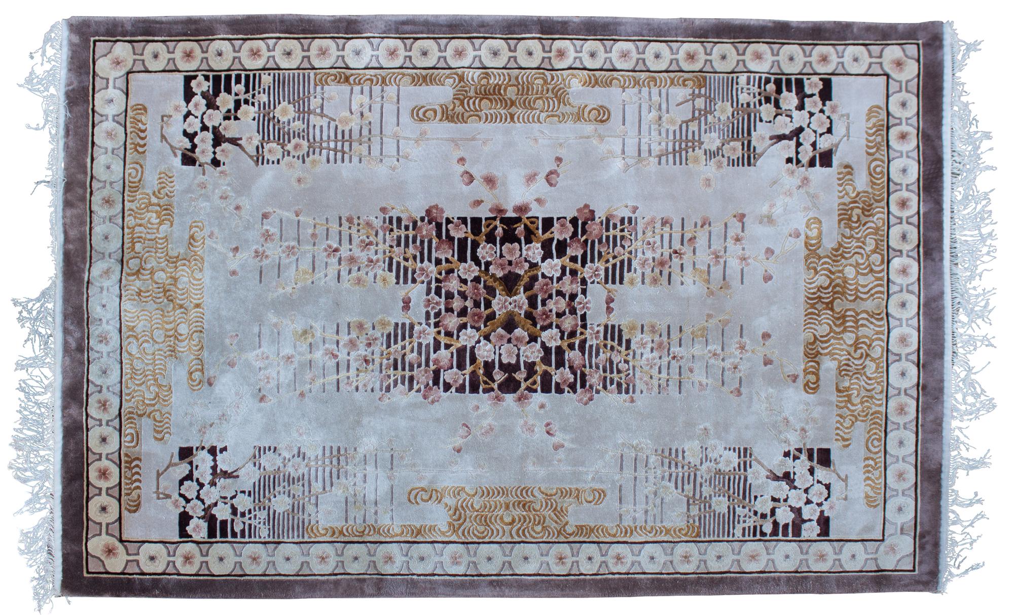 An Oriental Wool Rug 6 feet x 4 feet.