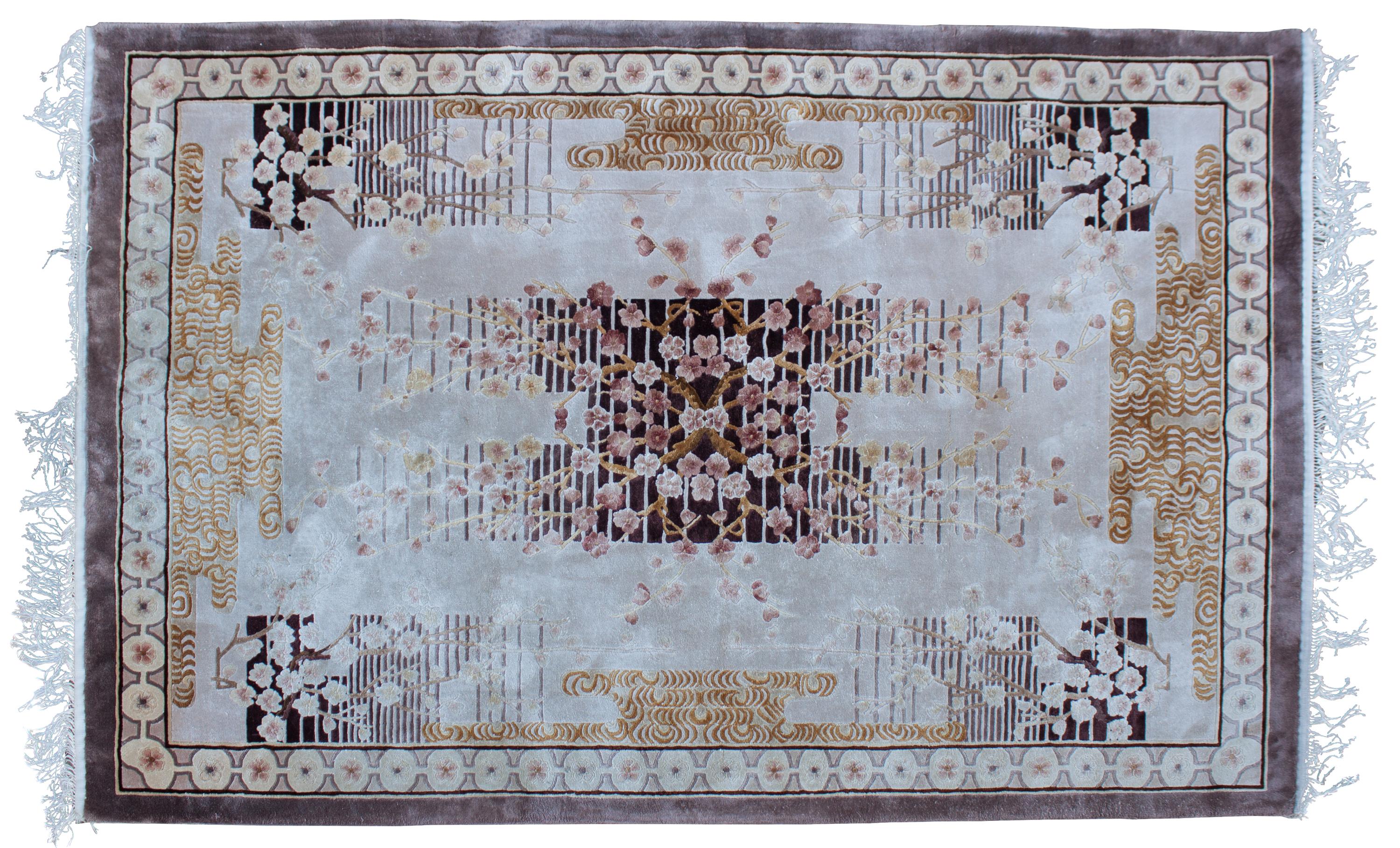 An Oriental Wool Rug 6 feet x 4 feet.