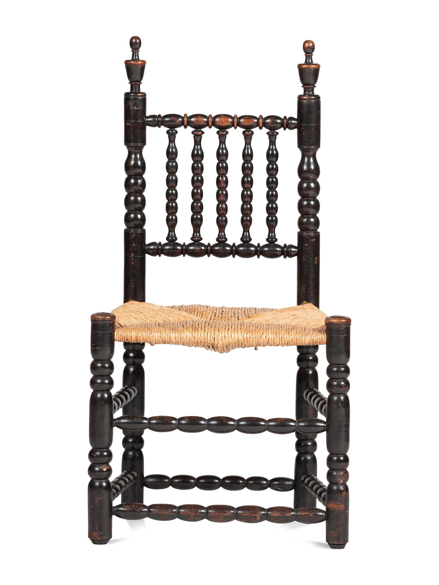 A Rare Pilgrim Century Black Painted Sausage-Turned Rush-Seat Side Chair