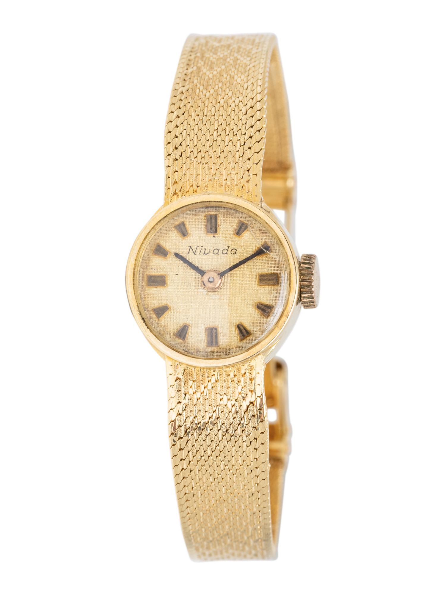 NIVADA, 18K YELLOW GOLD WATCH