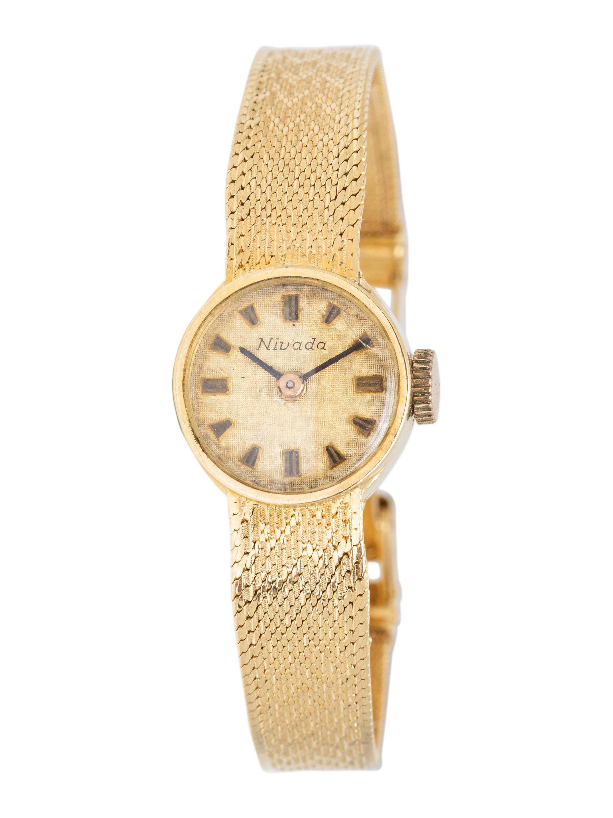 NIVADA, 18K YELLOW GOLD WATCH