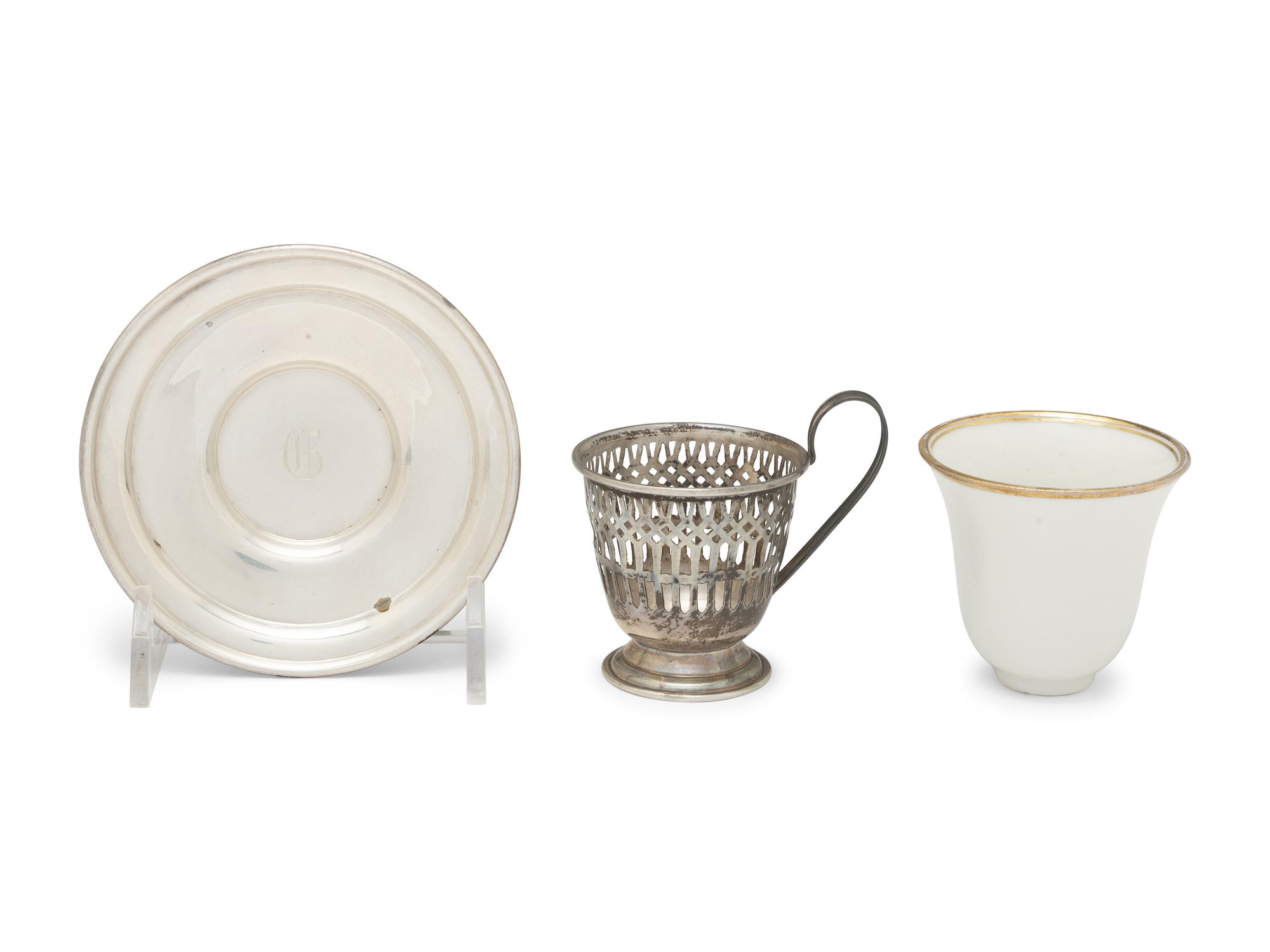 A Set of Twelve American Silver Coffee Cups and Saucers