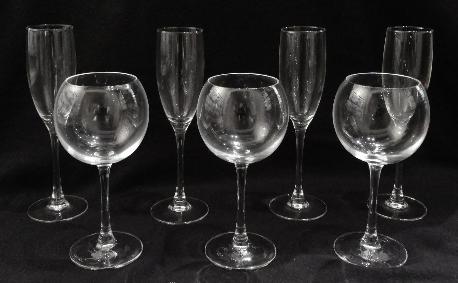 A Set of Glassware Height 8 1/2 inches.