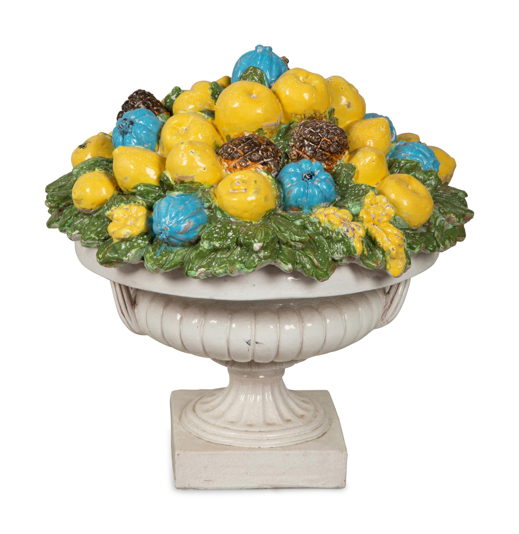 A Large Italian Glazed Terra Cotta Model of a Fruit-Filled Urn with Snails and Frogs