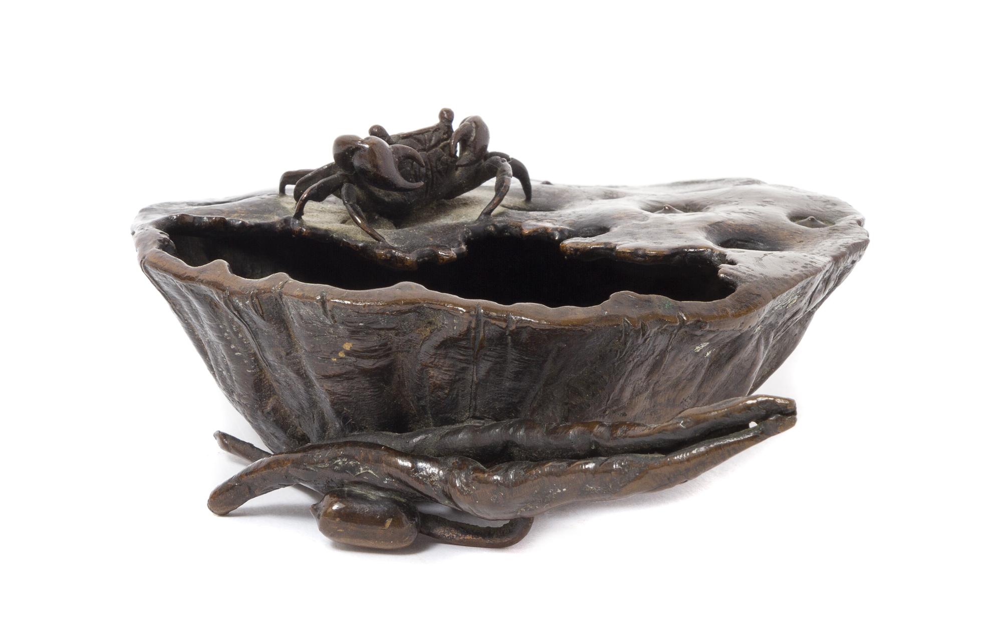 A Japanese Bronze Model of a Lotus Pod Length 4 3/4 inches.