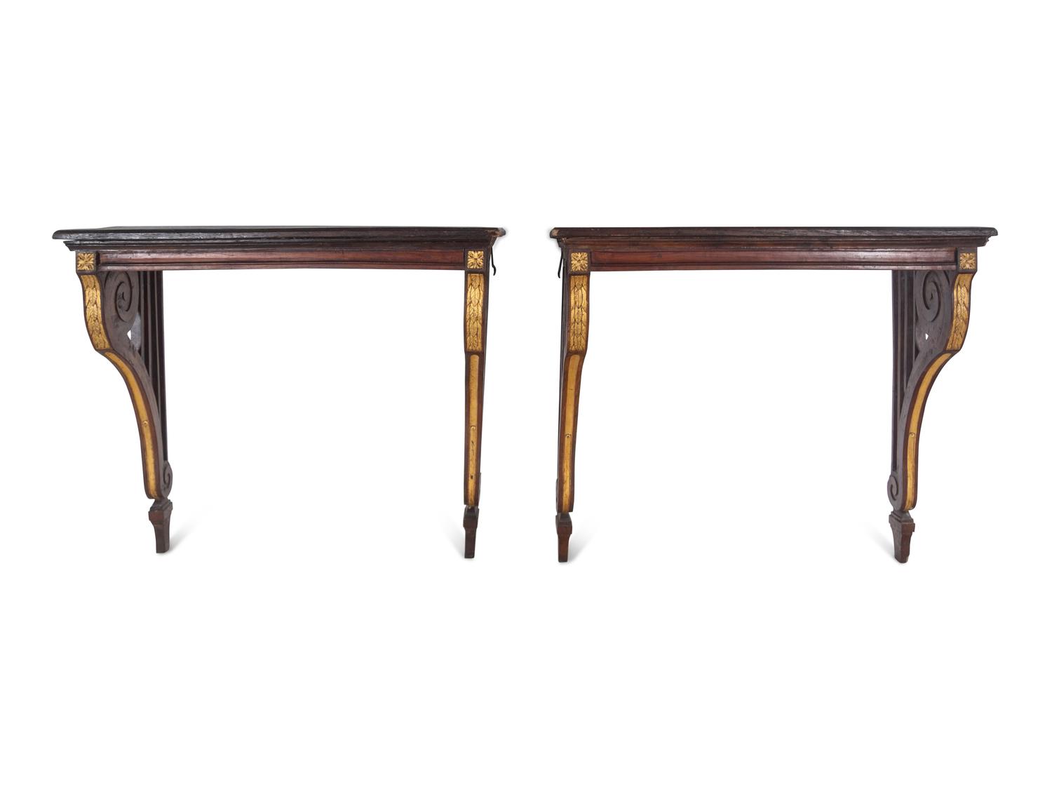 A Pair of Continental Parcel Gilt Walnut Console Tables