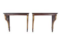 A Pair of Continental Parcel Gilt Walnut Console Tables