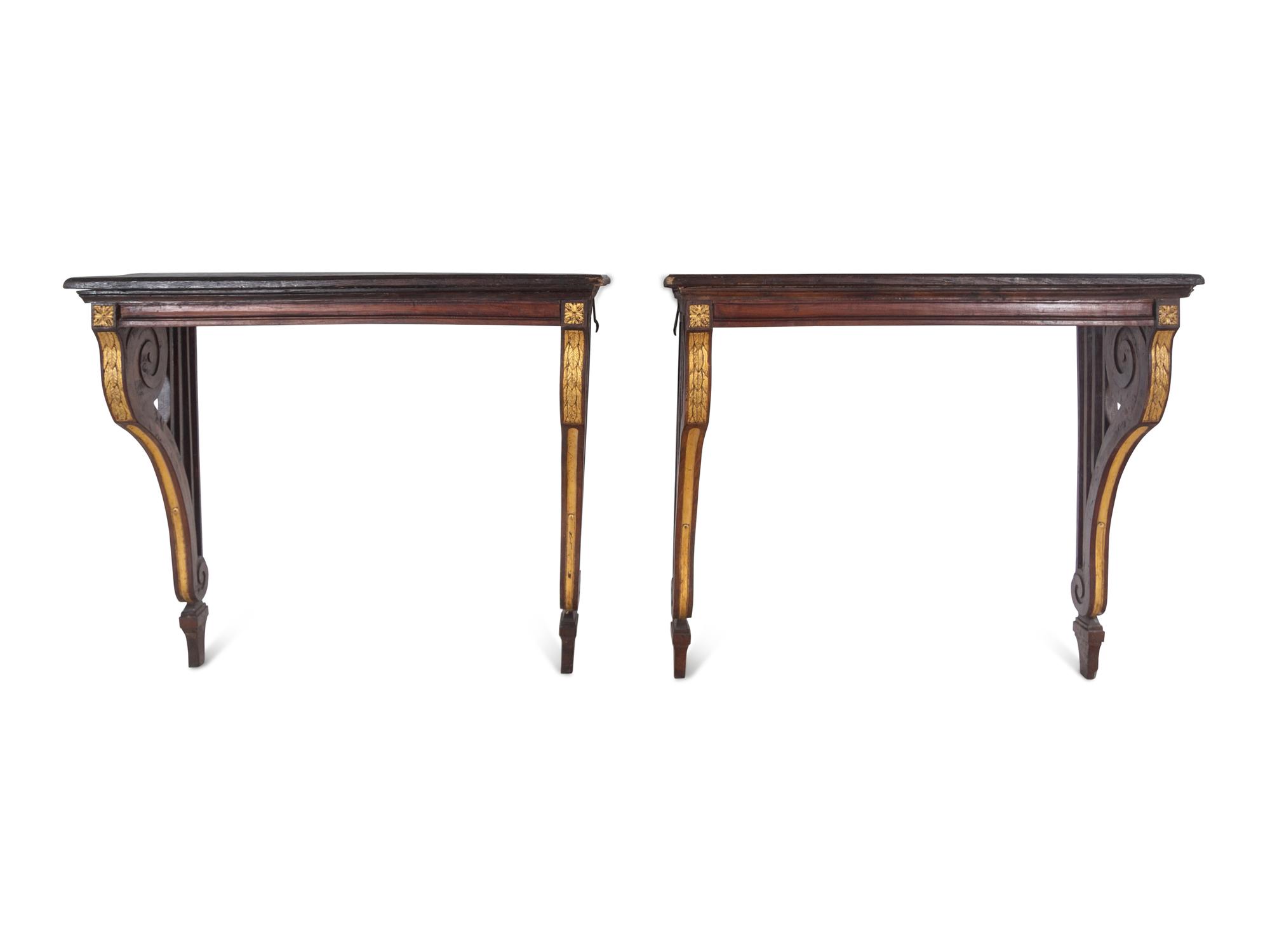 A Pair of Continental Parcel Gilt Walnut Console Tables