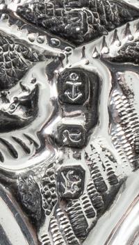 A Victorian Silver Tray, H. Matthews, Birmingham, 1898, of rectangular form with allover rococo decoration, centered by a vacant cartou