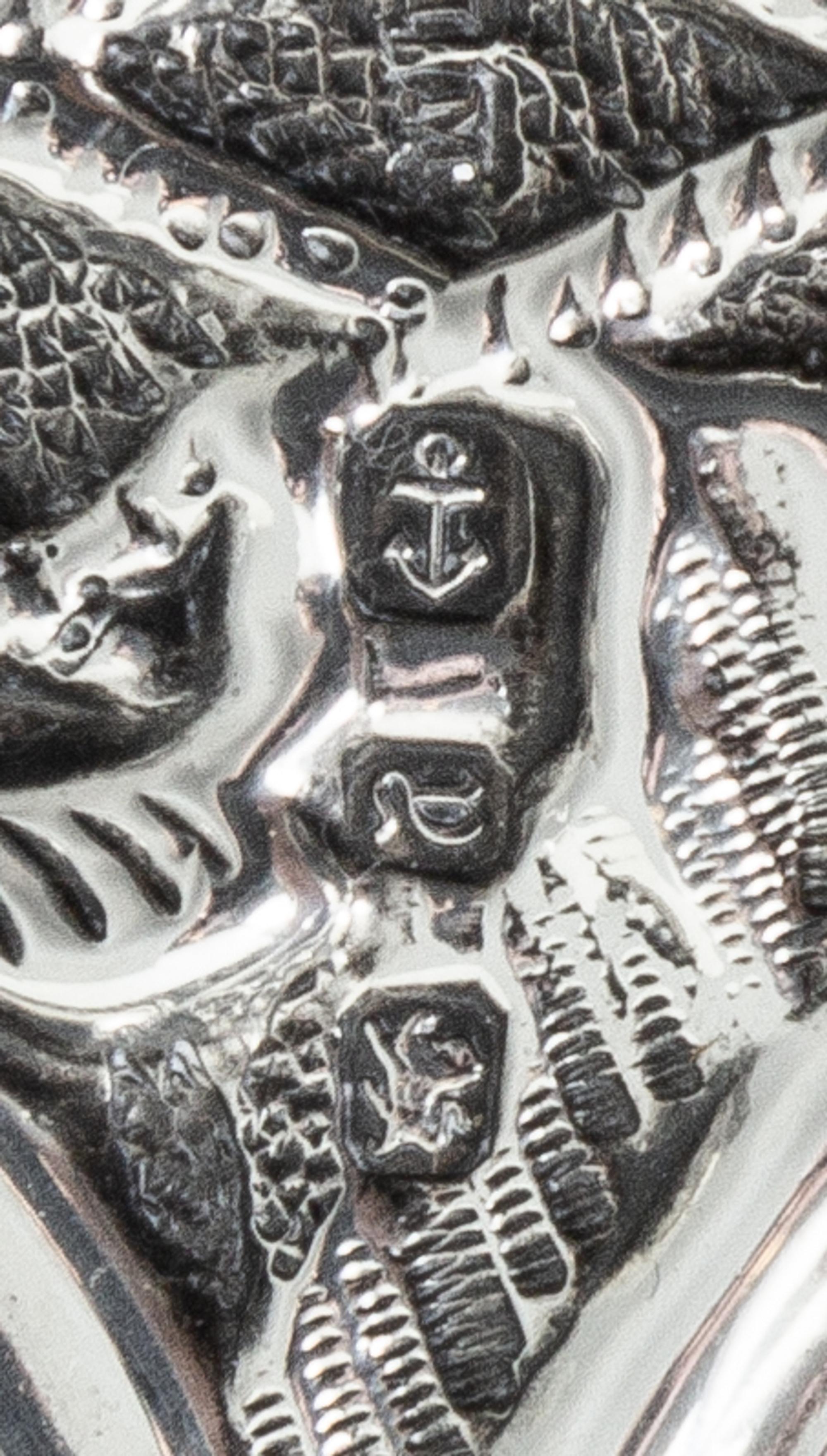 A Victorian Silver Tray, H. Matthews, Birmingham, 1898, of rectangular form with allover rococo decoration, centered by a vacant cartou