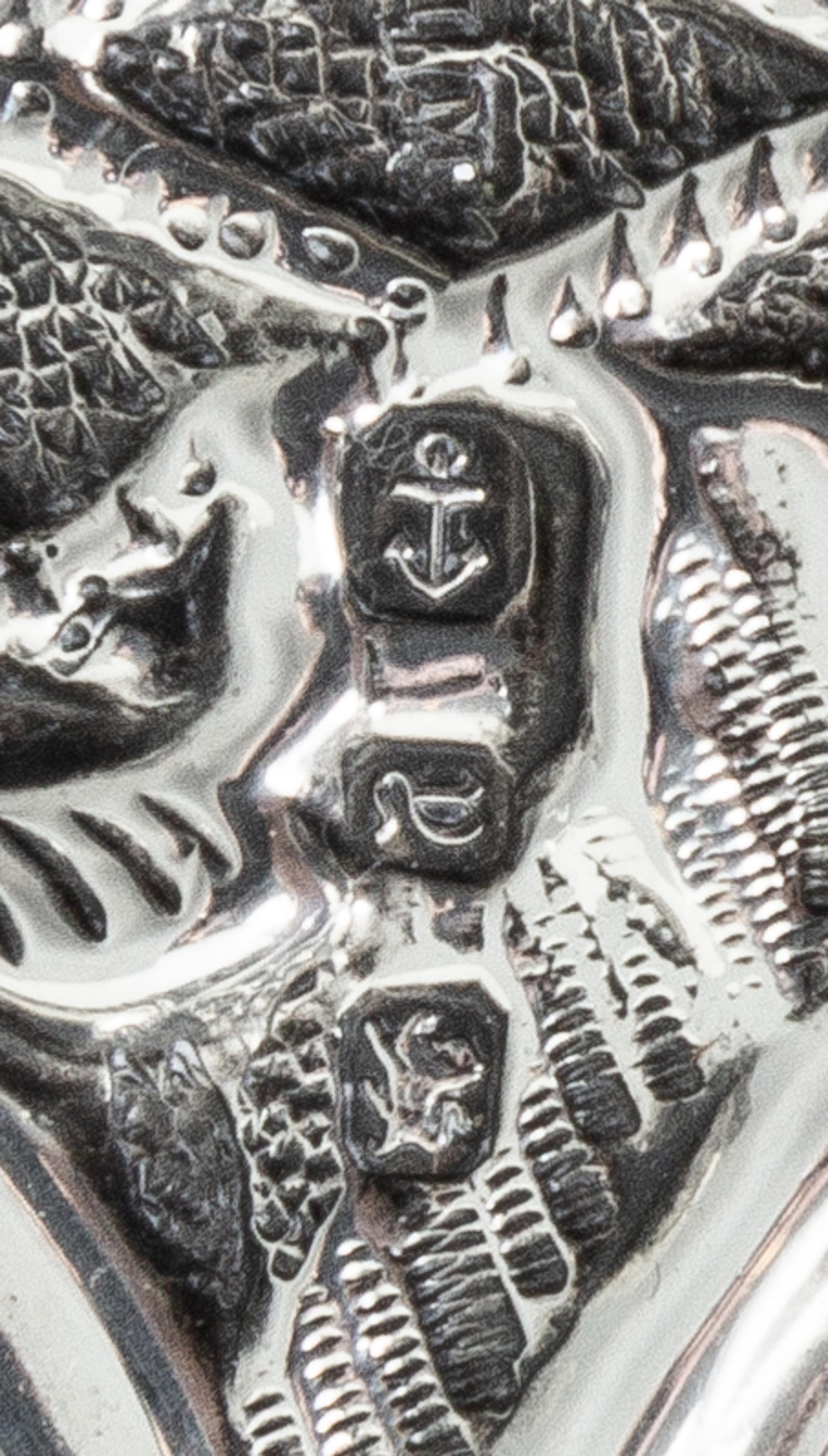 A Victorian Silver Tray, H. Matthews, Birmingham, 1898, of rectangular form with allover rococo decoration, centered by a vacant cartou