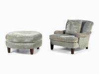 A Lounge Chair together with an Ottoman