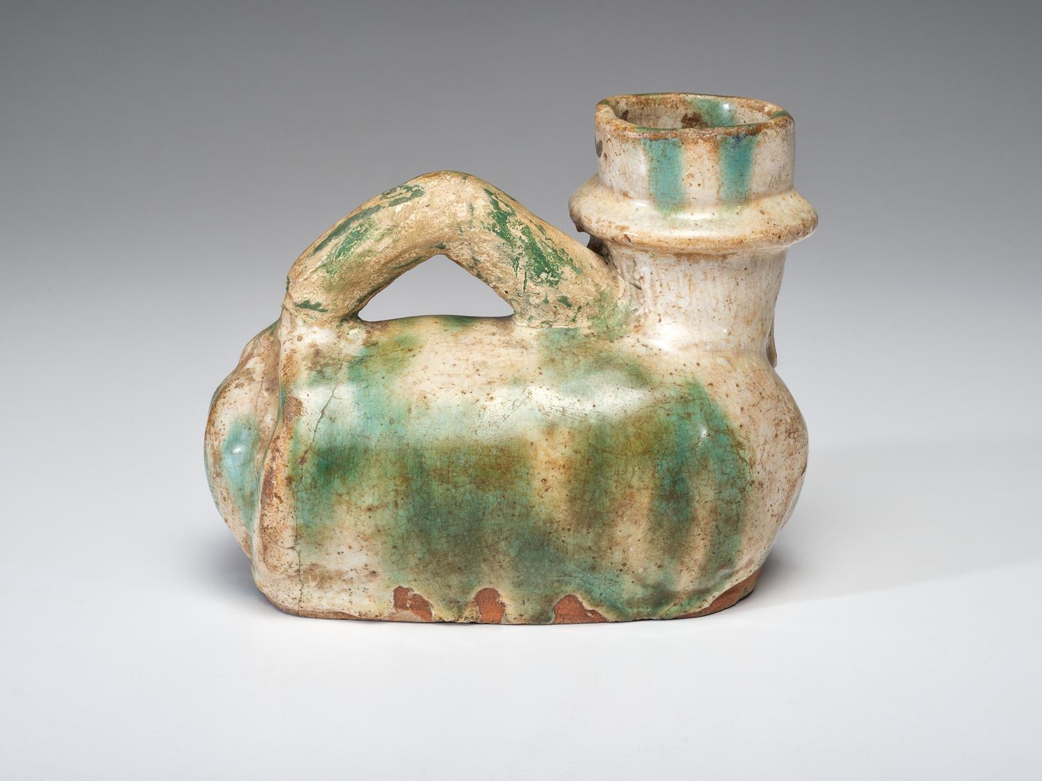 A Lead Glazed Satirical Ceramic Flask